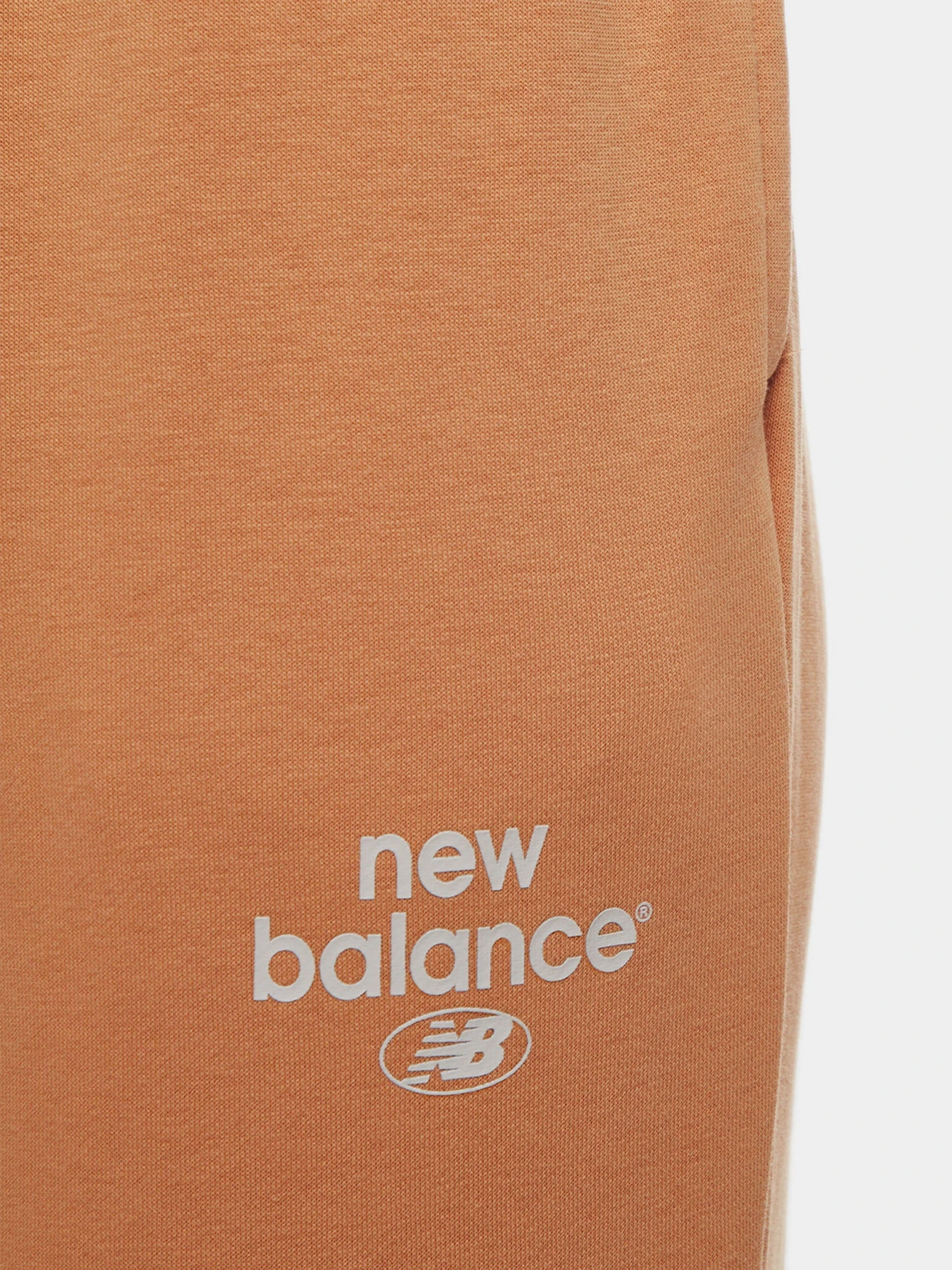 Брюки New Balance Essentials Reimagined Arch модель WP31508SEI Брюки New Balance Essentials Reimagined Arch модель WP31508SEI Фото