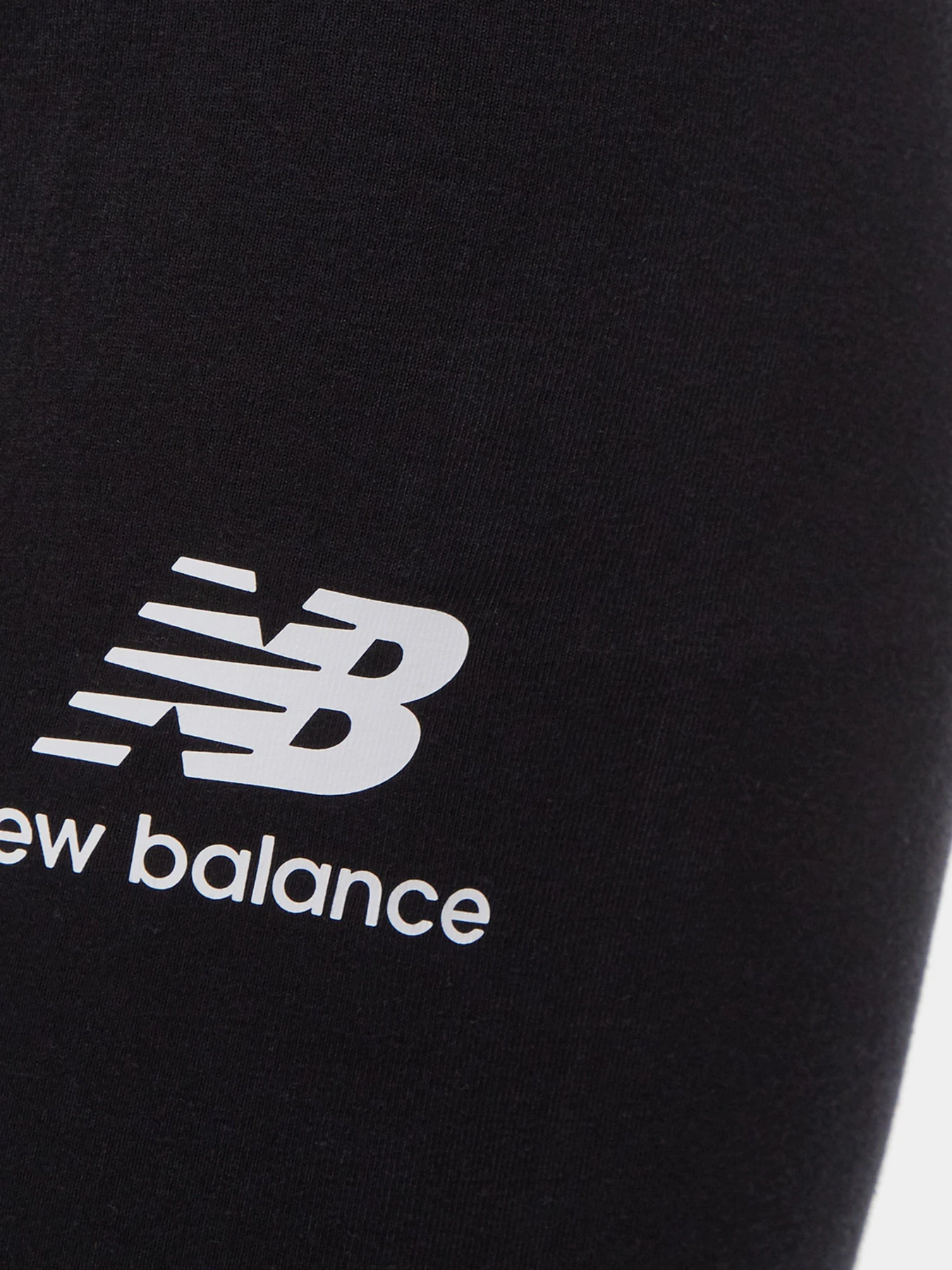 Брюки New Balance Essentials Stacked Logo модель WP31509BK Брюки New Balance Essentials Stacked Logo модель WP31509BK Фото