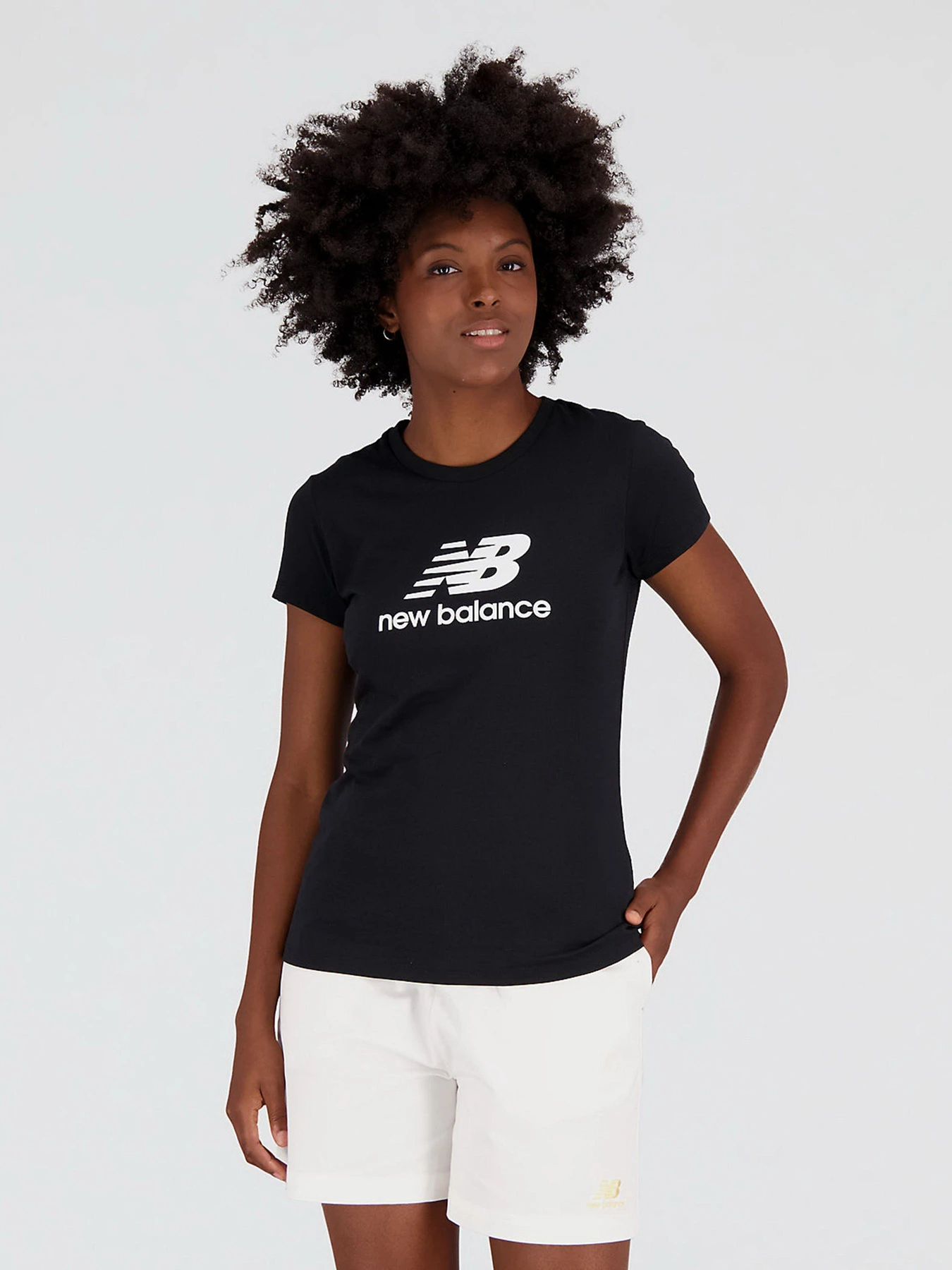 Футболки и поло New Balance Essentials Stacked Logo модель WT31546BK Футболки и поло New Balance Essentials Stacked Logo модель WT31546BK Фото