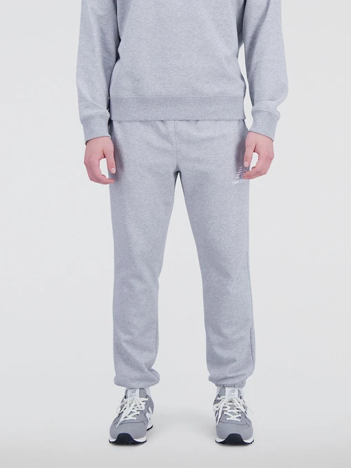 Штани New Balance Essentials модель MP31539AG Фото