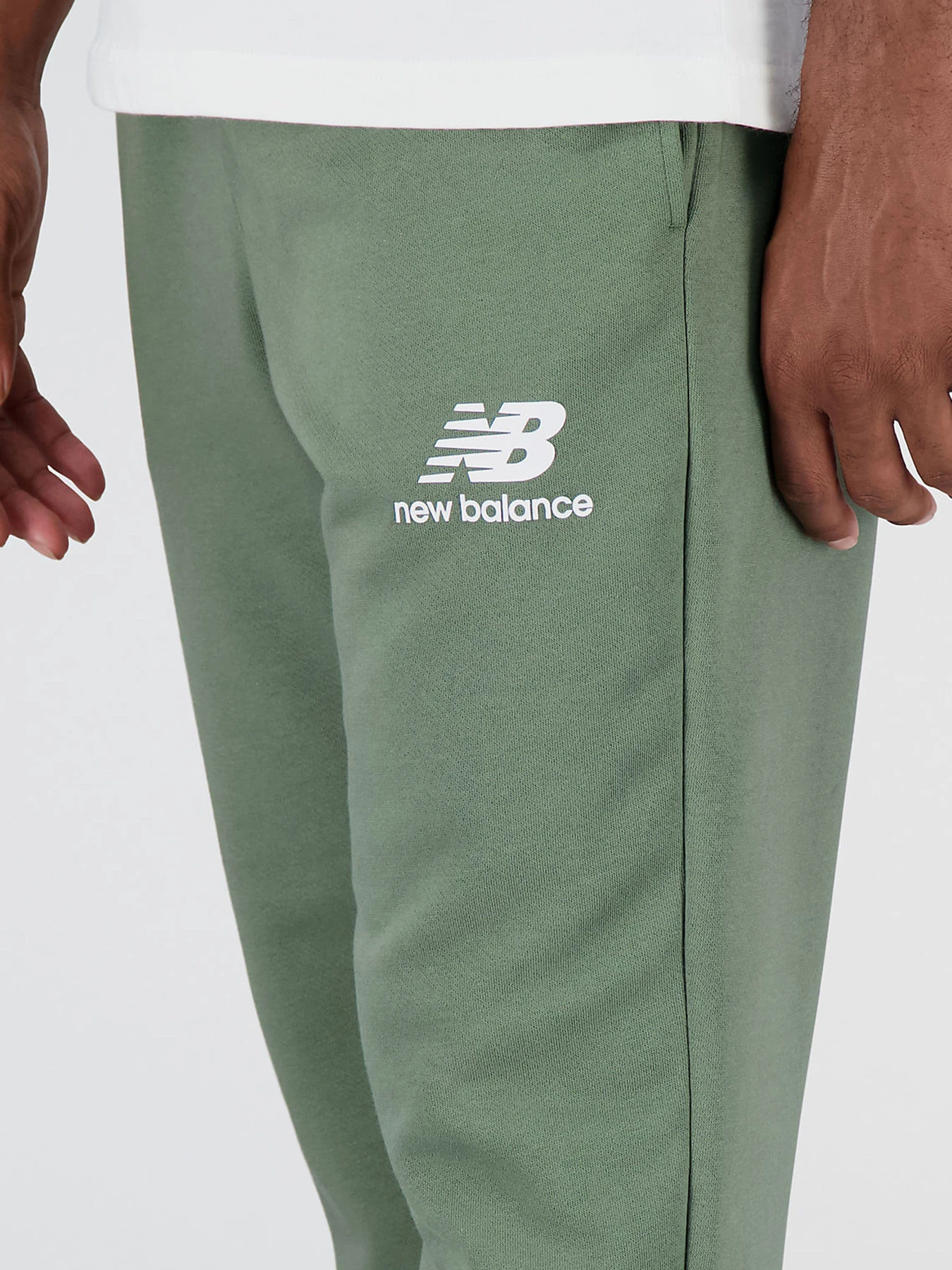 Брюки New Balance Essentials модель MP31539DON Брюки New Balance Essentials модель MP31539DON Фото