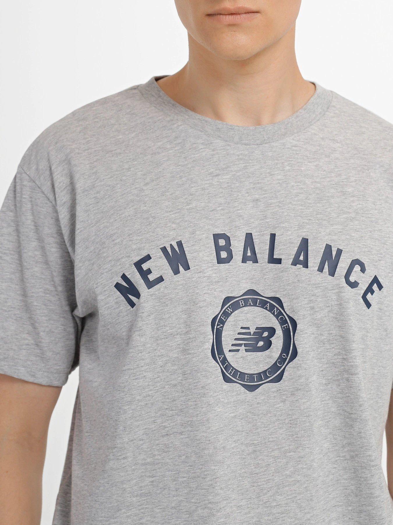 Футболки і поло New Balance Sport Seasonal Graphic модель MT31904AG Футболки і поло New Balance Sport Seasonal Graphic модель MT31904AG Фото