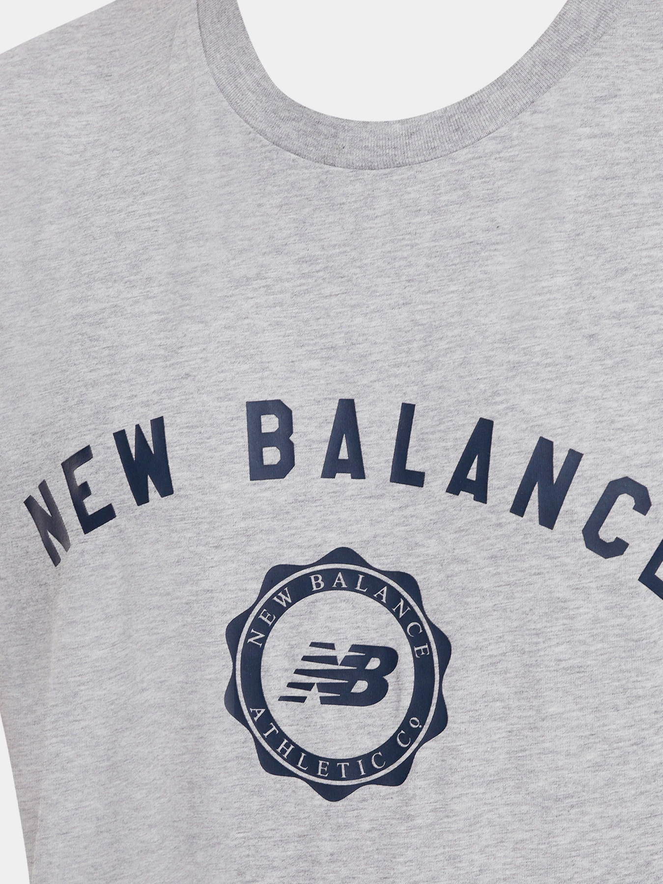 Футболки і поло New Balance Sport Seasonal Graphic модель MT31904AG Футболки і поло New Balance Sport Seasonal Graphic модель MT31904AG Фото