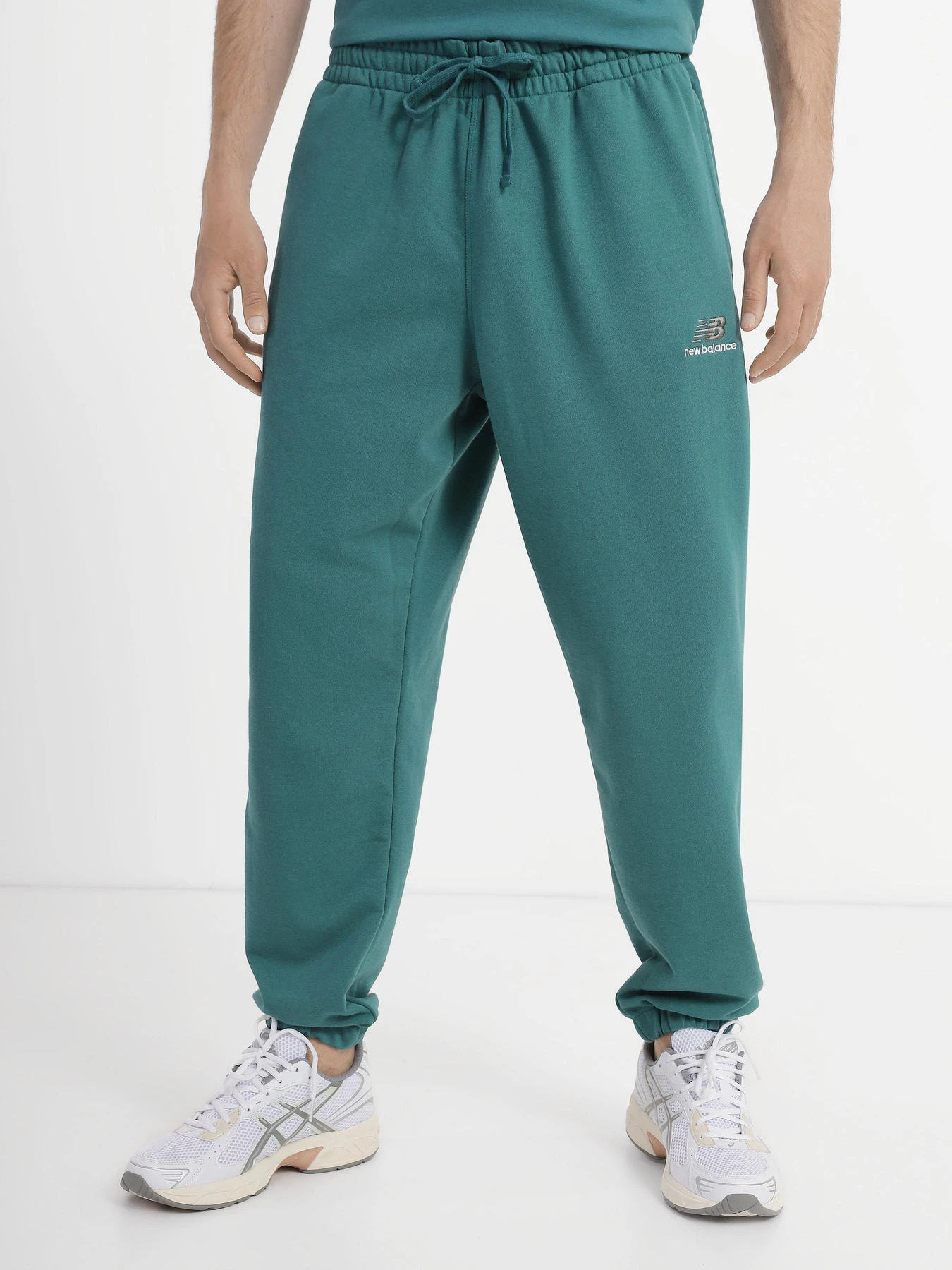 Брюки New Balance Uni-ssentials модель UP21500VDA Брюки New Balance Uni-ssentials модель UP21500VDA Фото
