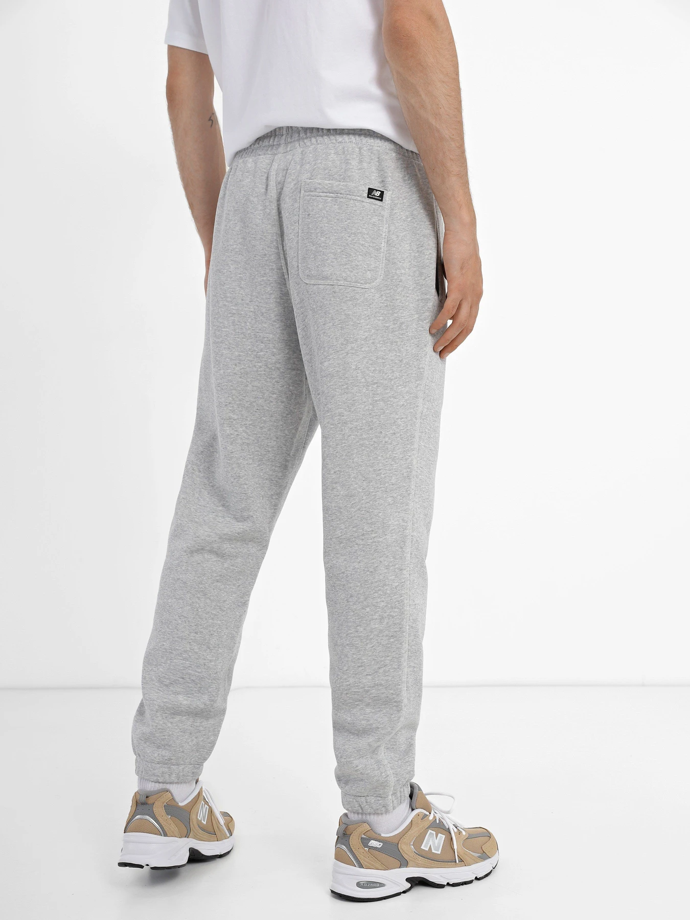 Брюки New Balance Essentials Brushed Back модель MP33521AG Фото