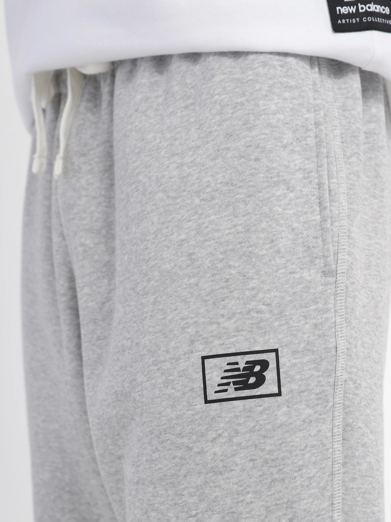 Брюки New Balance Essentials Brushed Back модель MP33521AG Фото