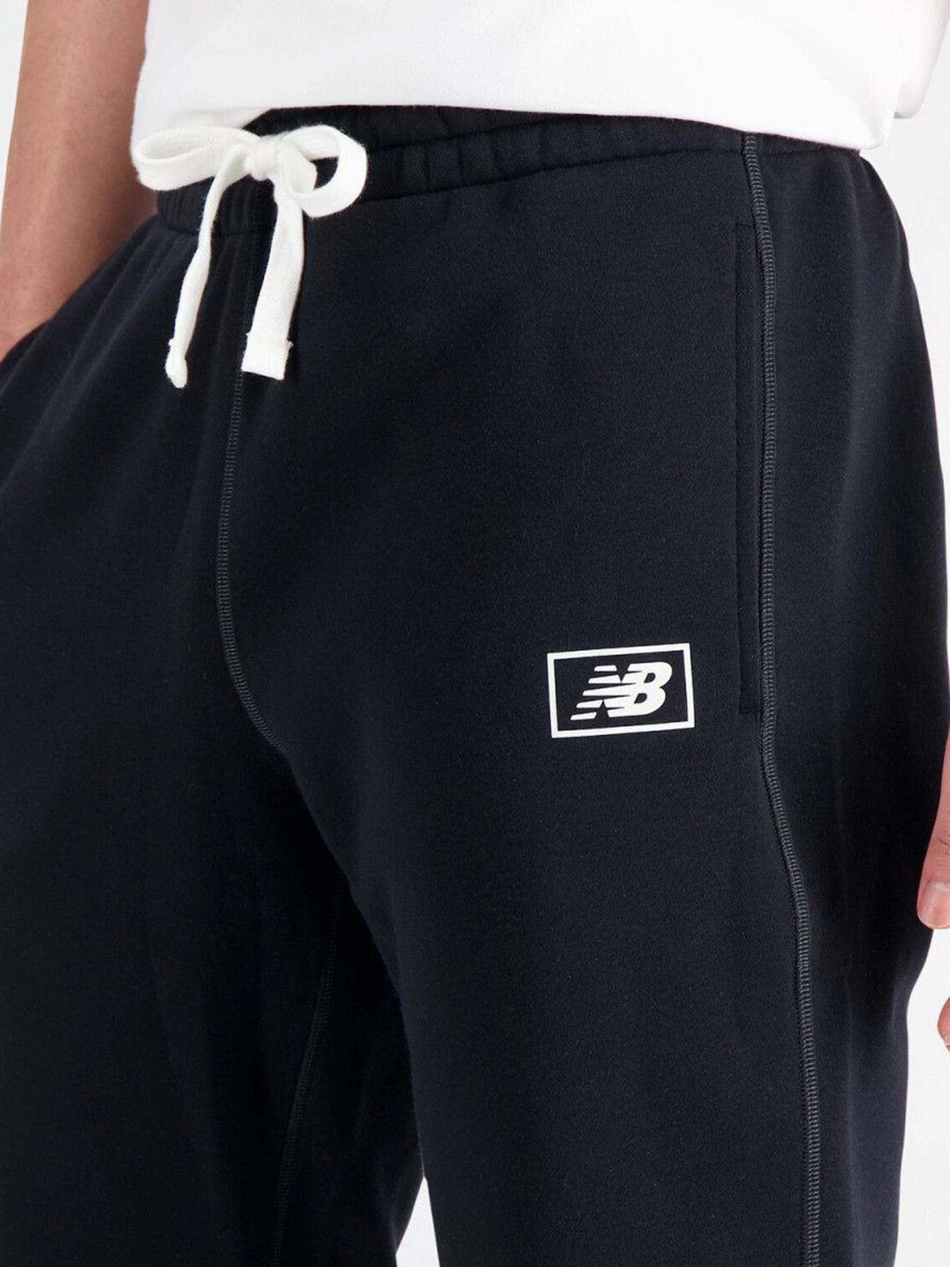 Брюки New Balance Essentials Brushed Back модель MP33521BK Брюки New Balance Essentials Brushed Back модель MP33521BK Фото