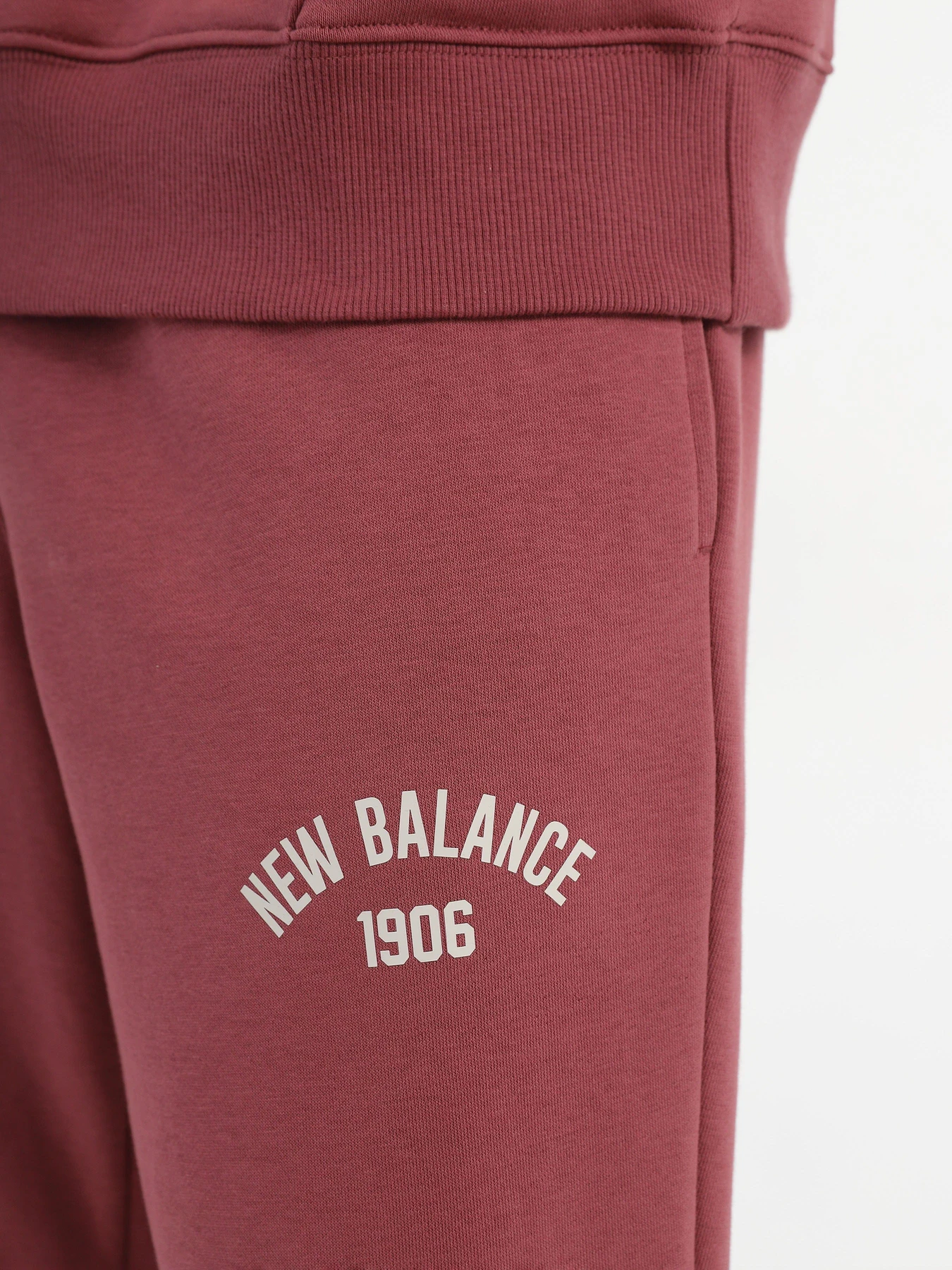 Брюки New Balance Essentials Varsity модель MP33551WAD Фото