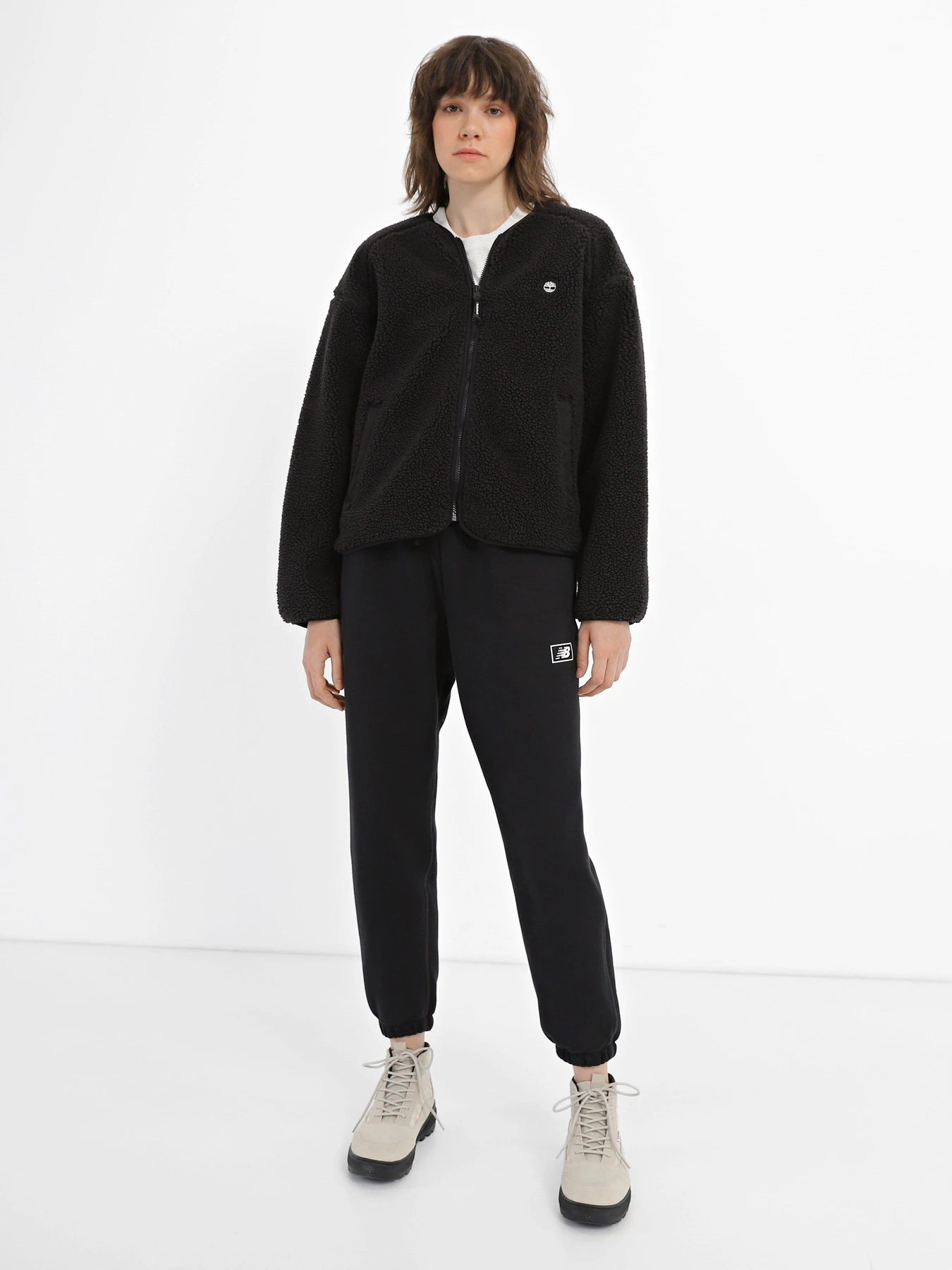 Брюки New Balance Essentials Brushed Back Fleece модель WP33500BK Брюки New Balance Essentials Brushed Back Fleece модель WP33500BK Фото