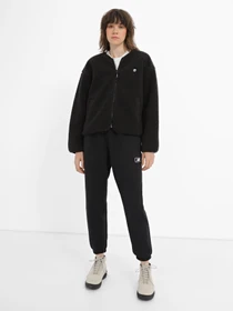 Брюки New Balance Essentials Brushed Back Fleece модель WP33500BK Фото