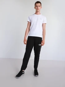 Брюки The North Face Mountain Athletics Woven Pant модель NF0A5599KX71 Фото