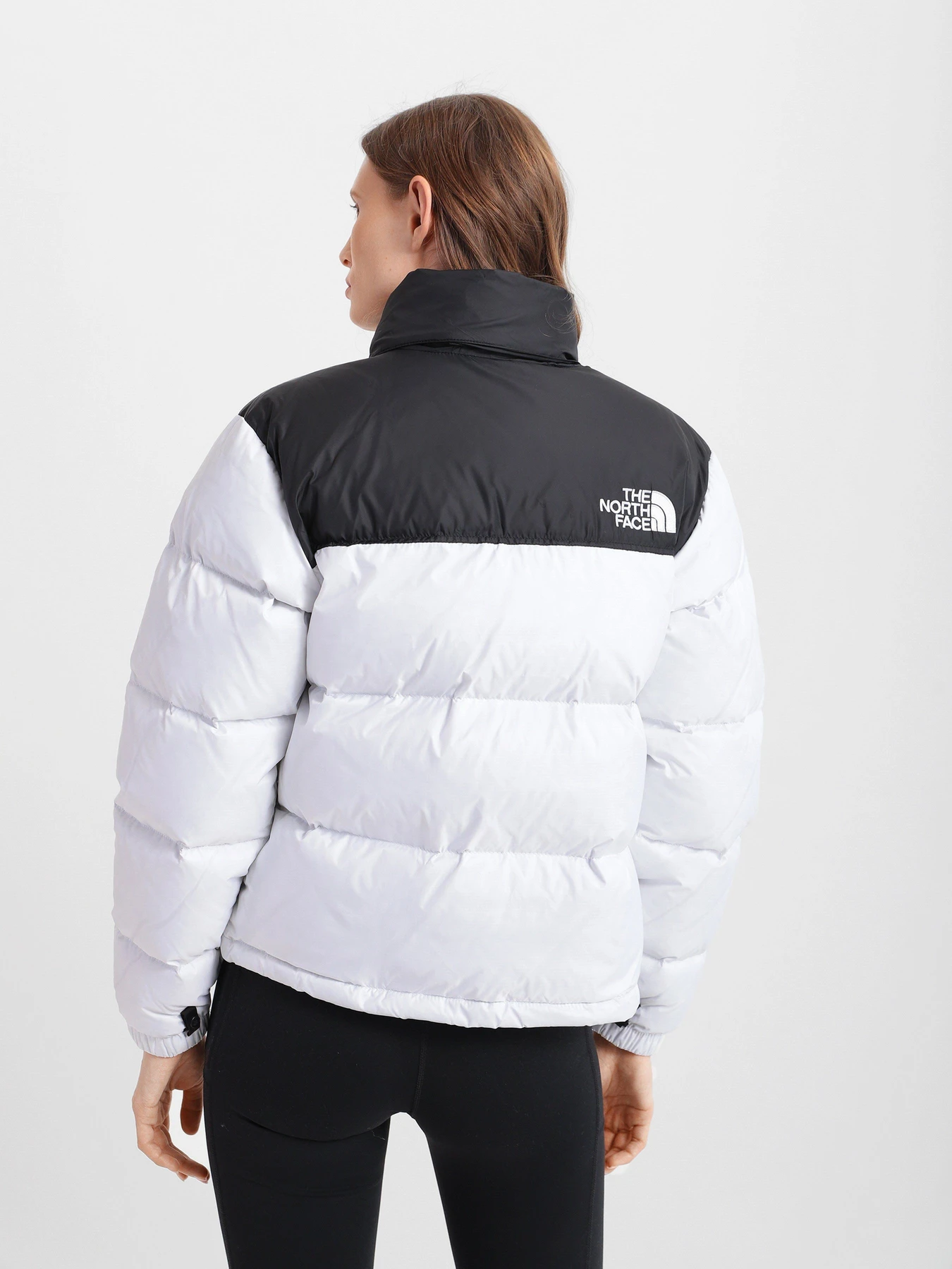 Куртки та дублянки The North Face 1996 Retro Nupste модель NF0A3XEOFN41 Фото