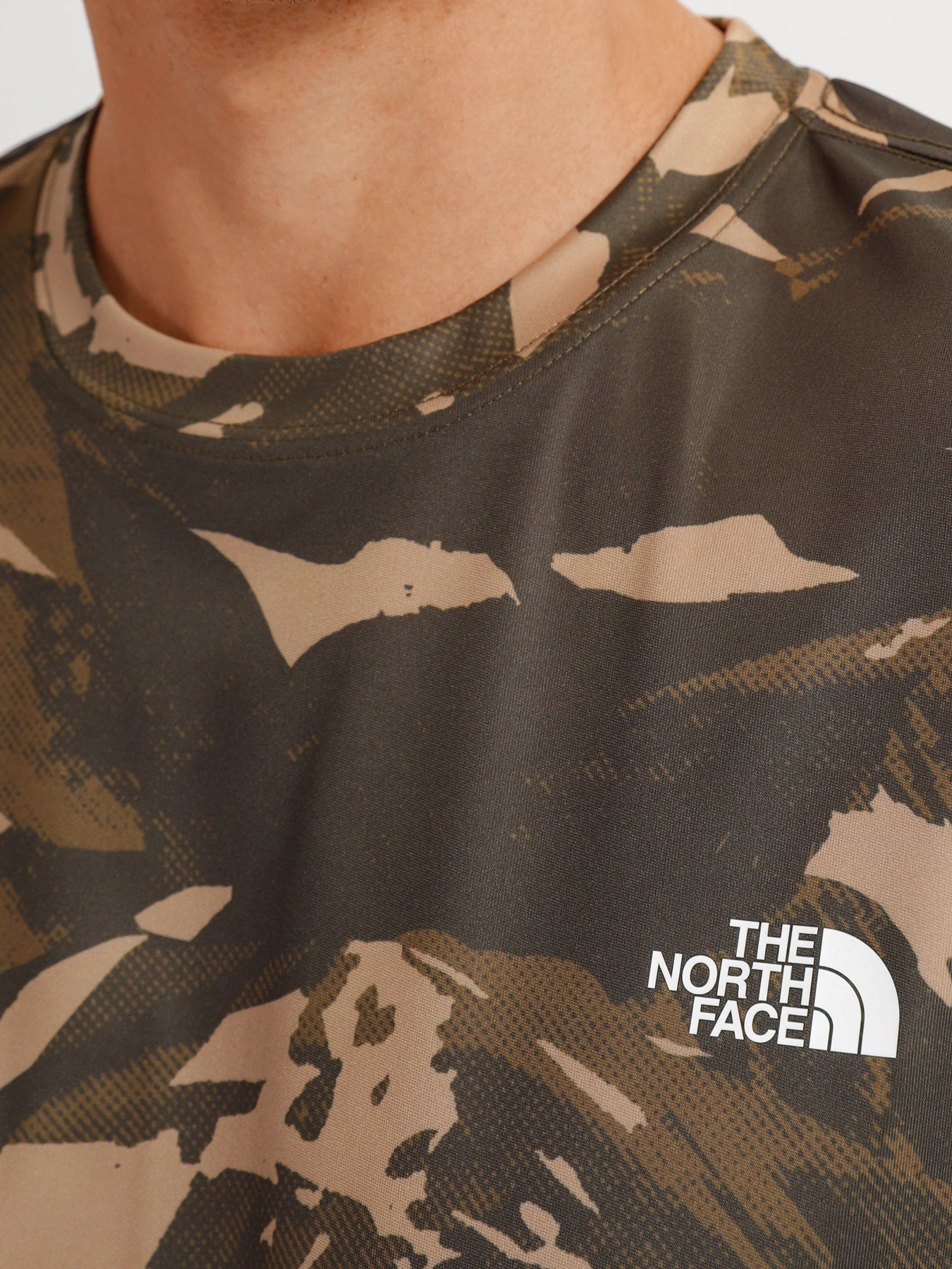 Футболки и поло The North Face Reaxion Amp Crew модель NF0A3RX35541 Футболки и поло The North Face Reaxion Amp Crew модель NF0A3RX35541 Фото