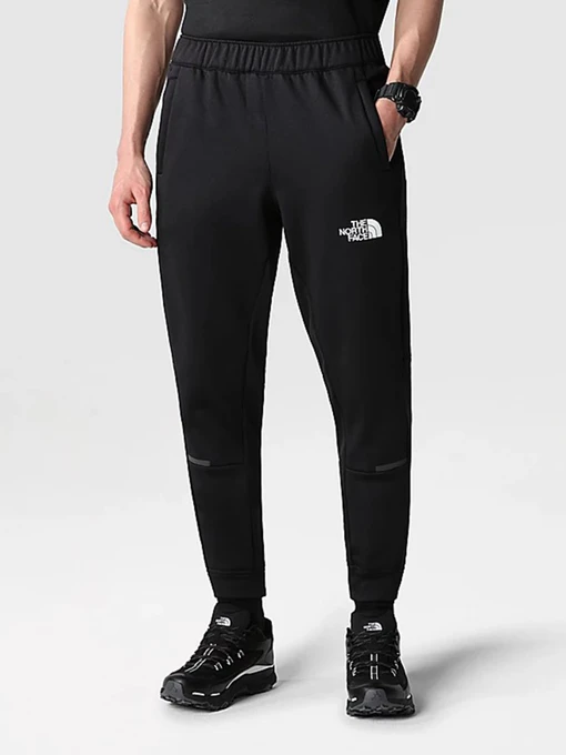 Штани The North Face Mountain Athletics Wind модель NF0A7ZANJK31 Фото