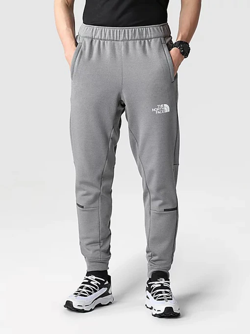 Штани The North Face Mountain Athletics Wind модель NF0A7ZANDYY1 Фото