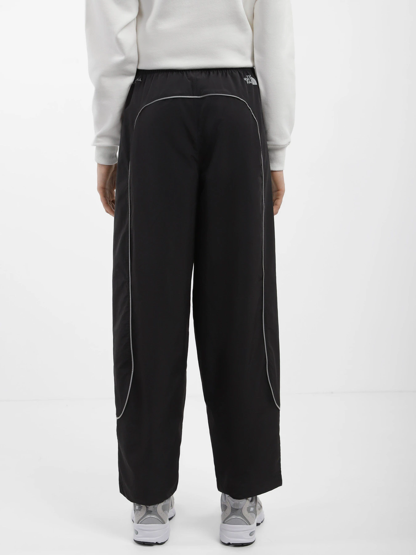 Брюки The North Face Tek Piping Wind модель NF0A84P7JK31 Брюки The North Face Tek Piping Wind модель NF0A84P7JK31 Фото