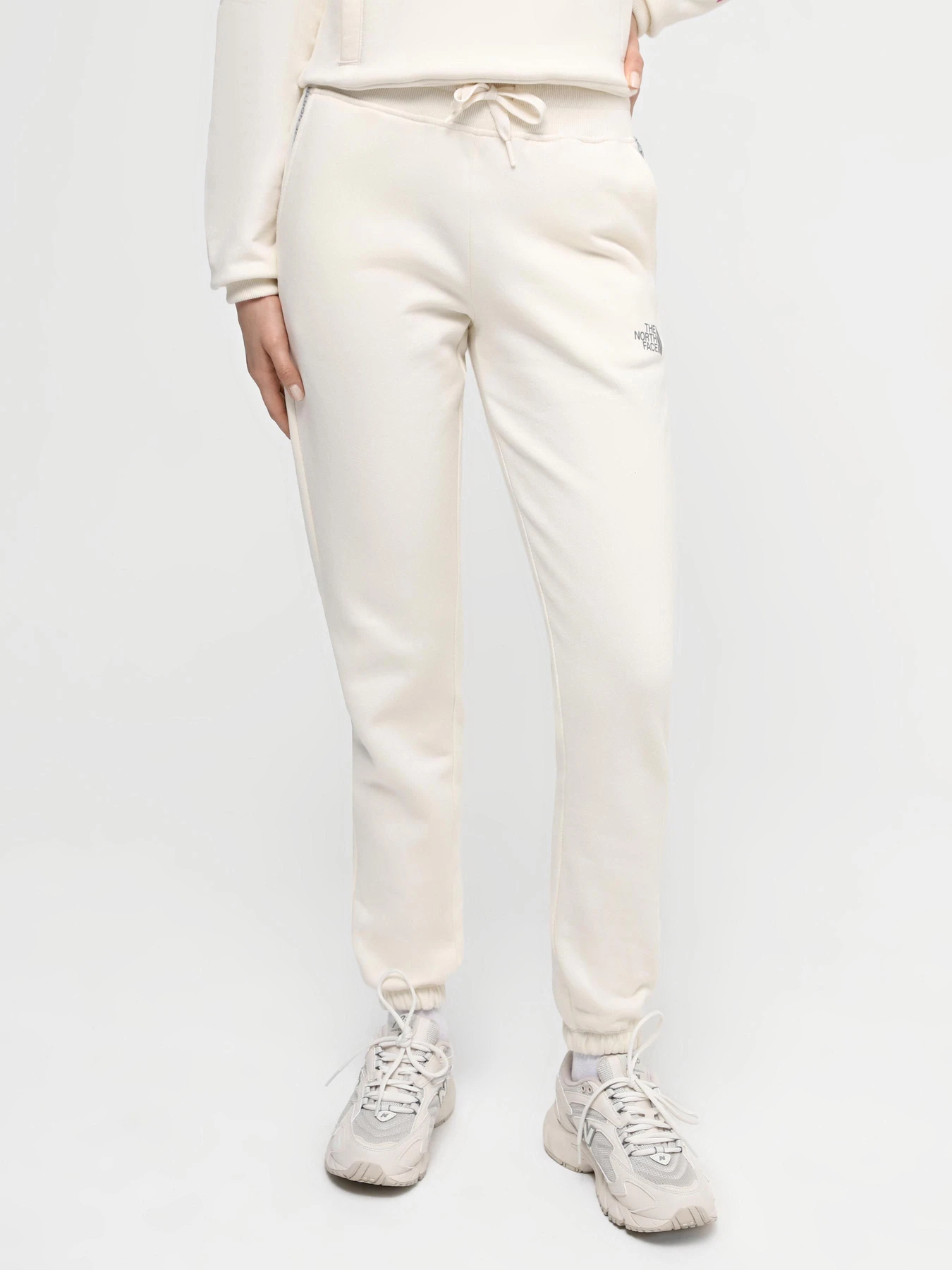 Брюки The North Face W Zumu Jogger модель NF0A87DMQLI1 Фото