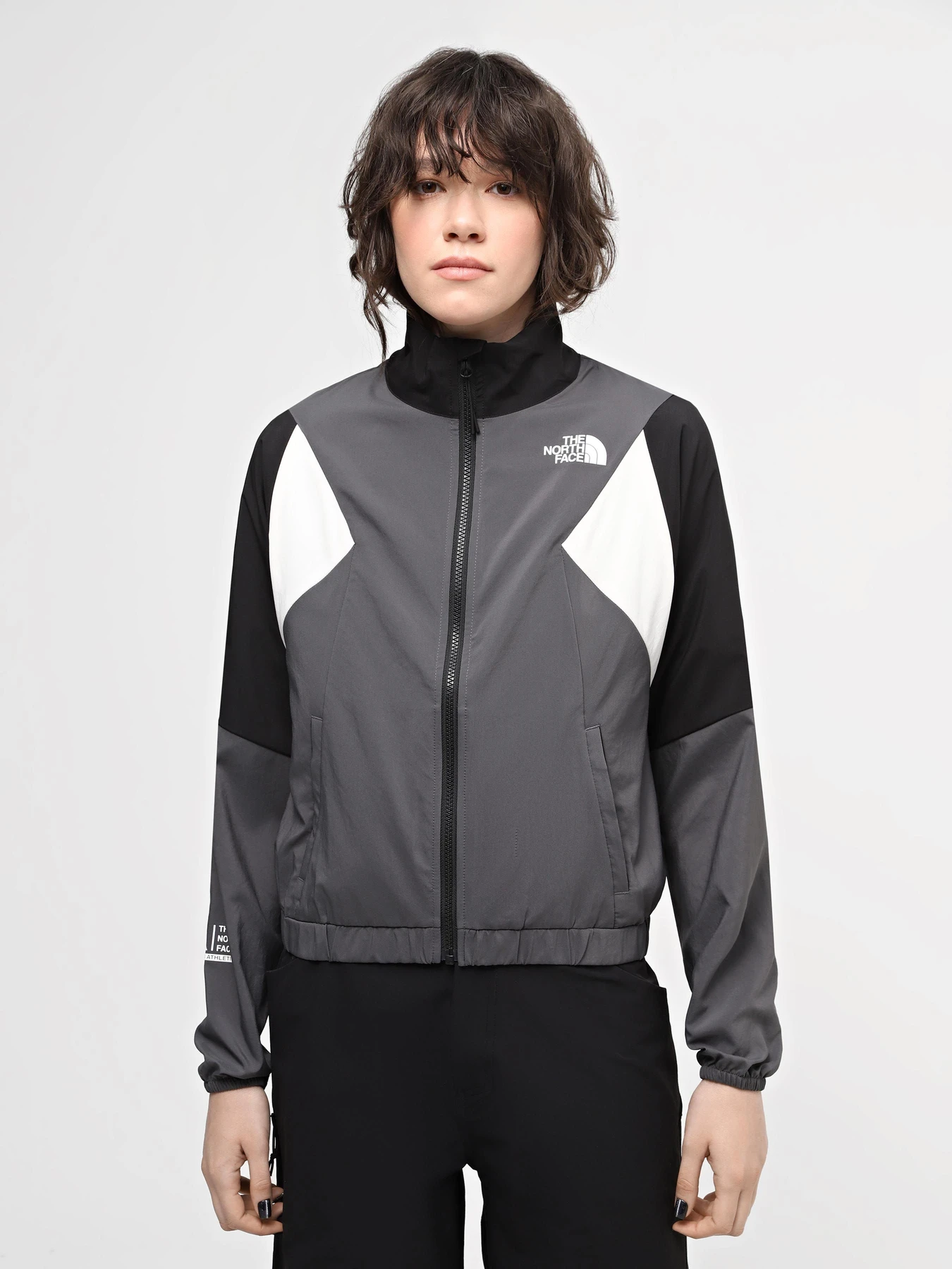 Куртки и дубленки The North Face W Ma Wind Track Top модель NF0A87FM3OD1 Фото