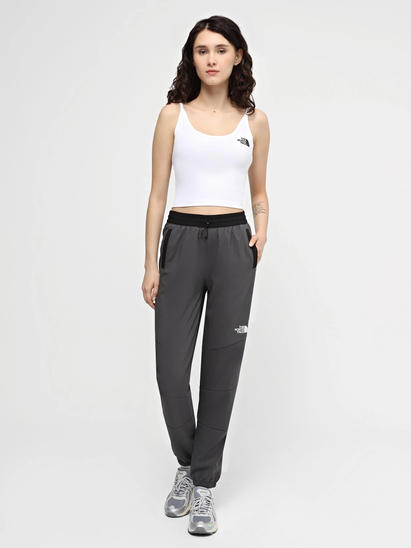 Брюки The North Face W Ma Wind Track Pant модель NF0A87G5WUO1 Брюки The North Face W Ma Wind Track Pant модель NF0A87G5WUO1 Фото