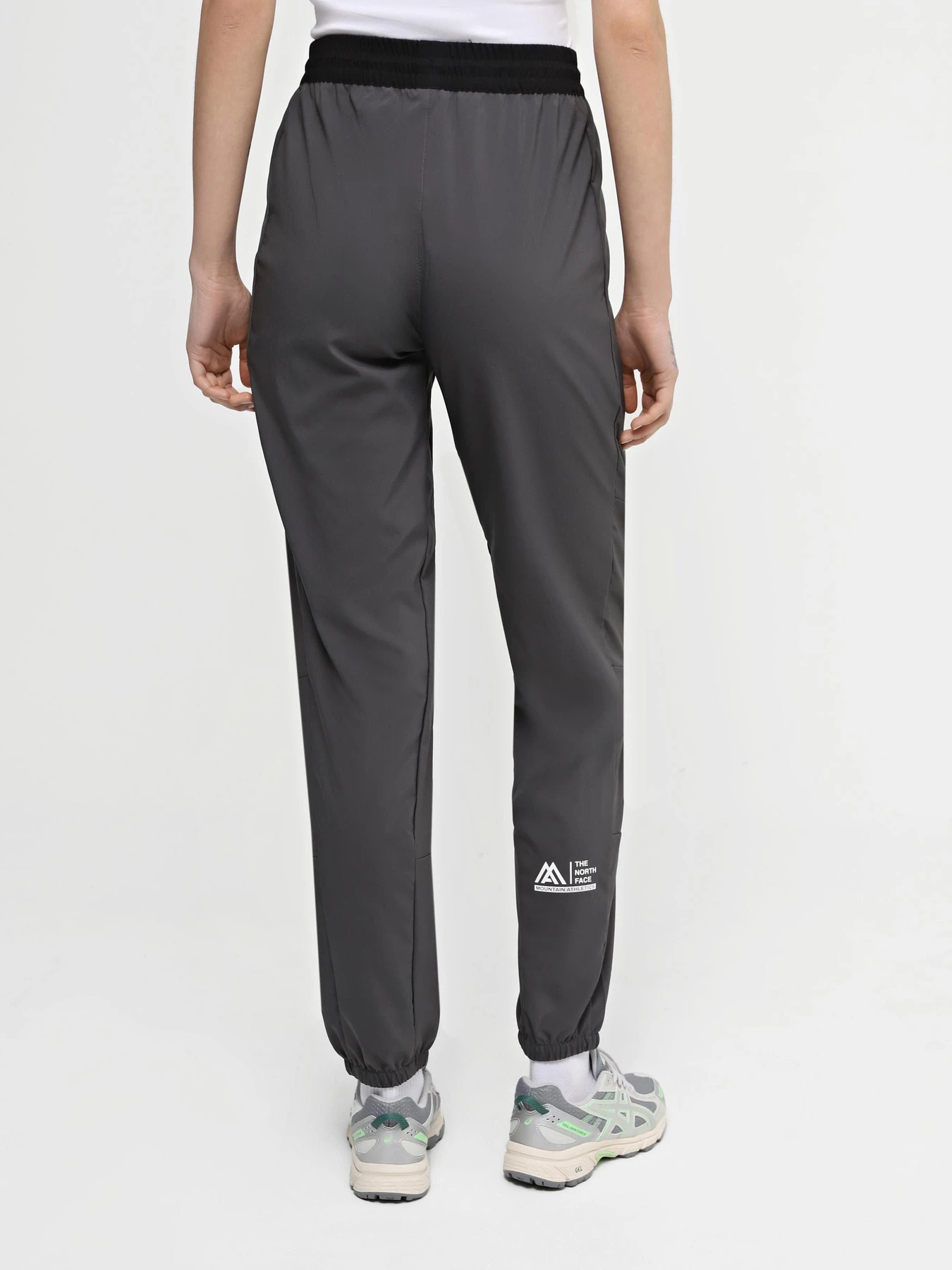Брюки The North Face W Ma Wind Track Pant модель NF0A87G5WUO1 Брюки The North Face W Ma Wind Track Pant модель NF0A87G5WUO1 Фото
