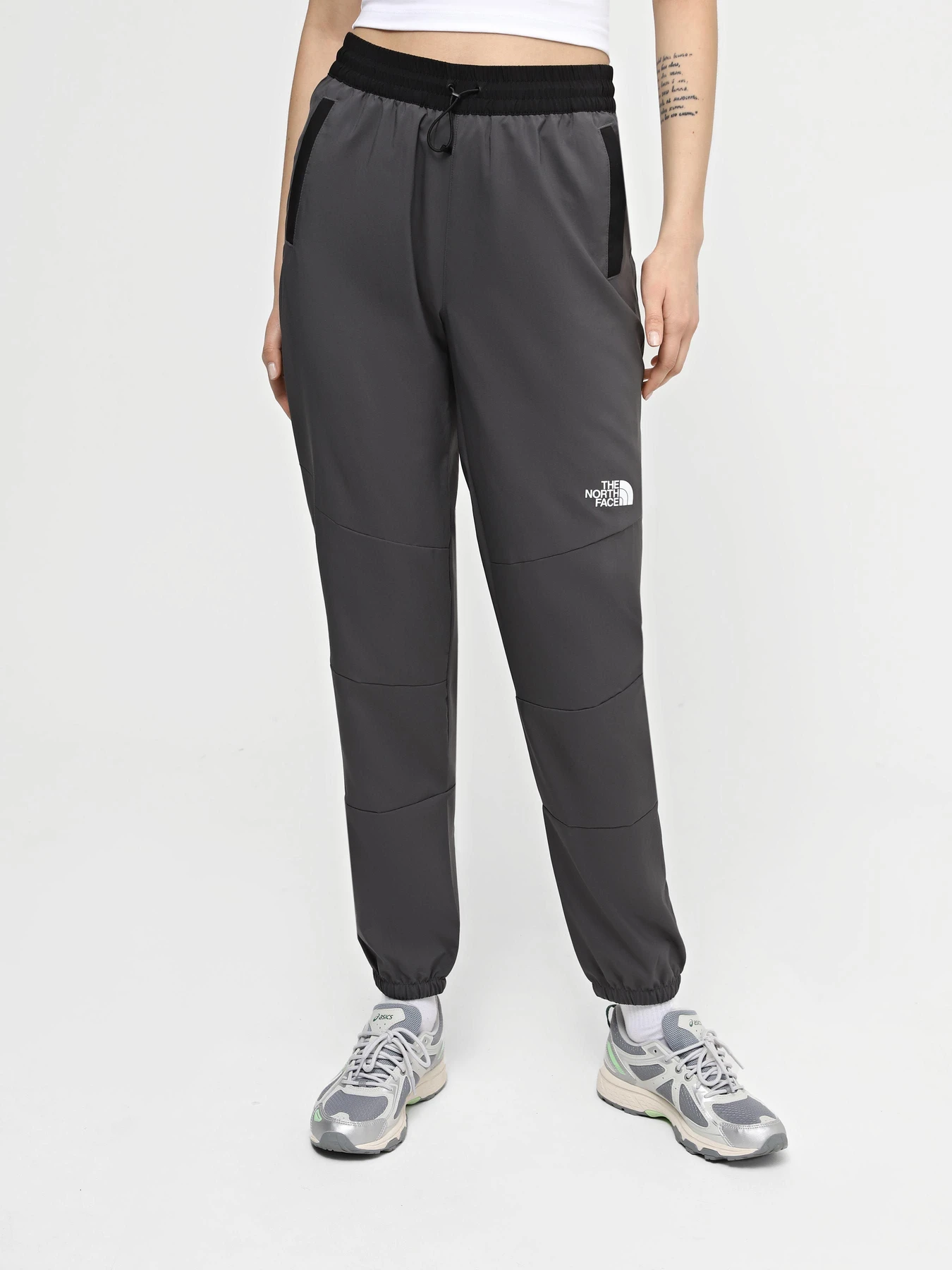 Брюки The North Face W Ma Wind Track Pant модель NF0A87G5WUO1 Брюки The North Face W Ma Wind Track Pant модель NF0A87G5WUO1 Фото
