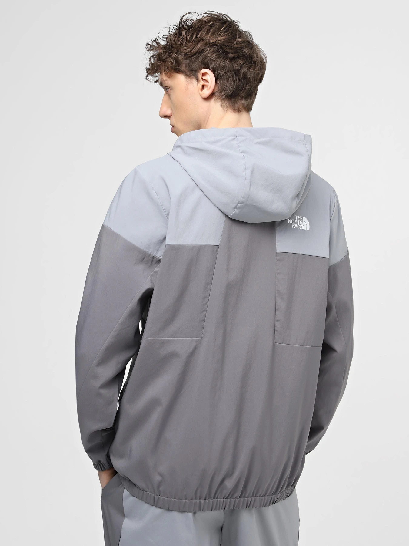 Куртки та дублянки The North Face M Ma Wind Track Hoodie модель NF0A87J2W2O1 Фото
