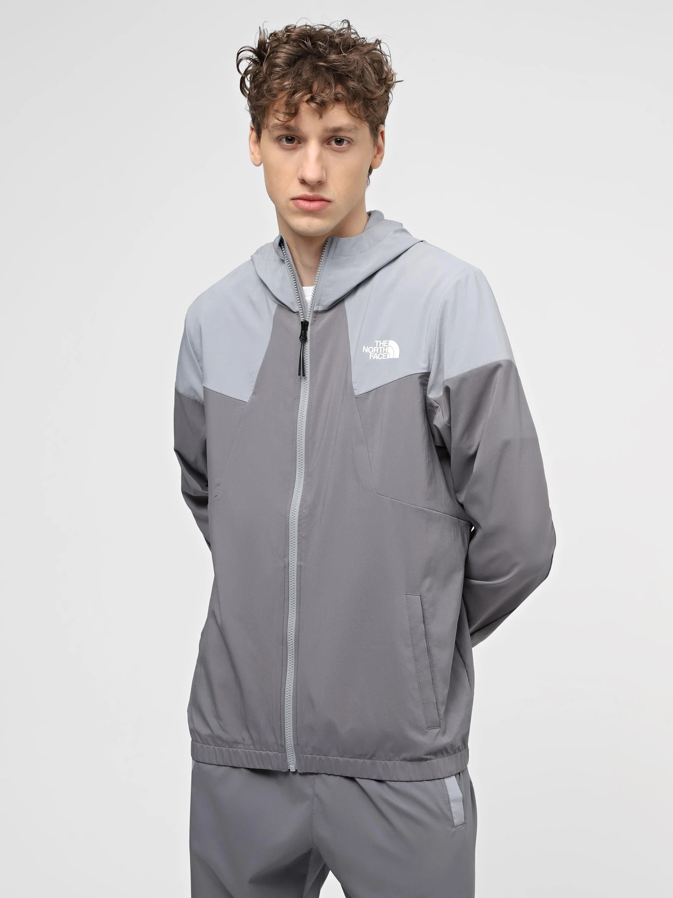 Куртки та дублянки The North Face M Ma Wind Track Hoodie модель NF0A87J2W2O1 Фото