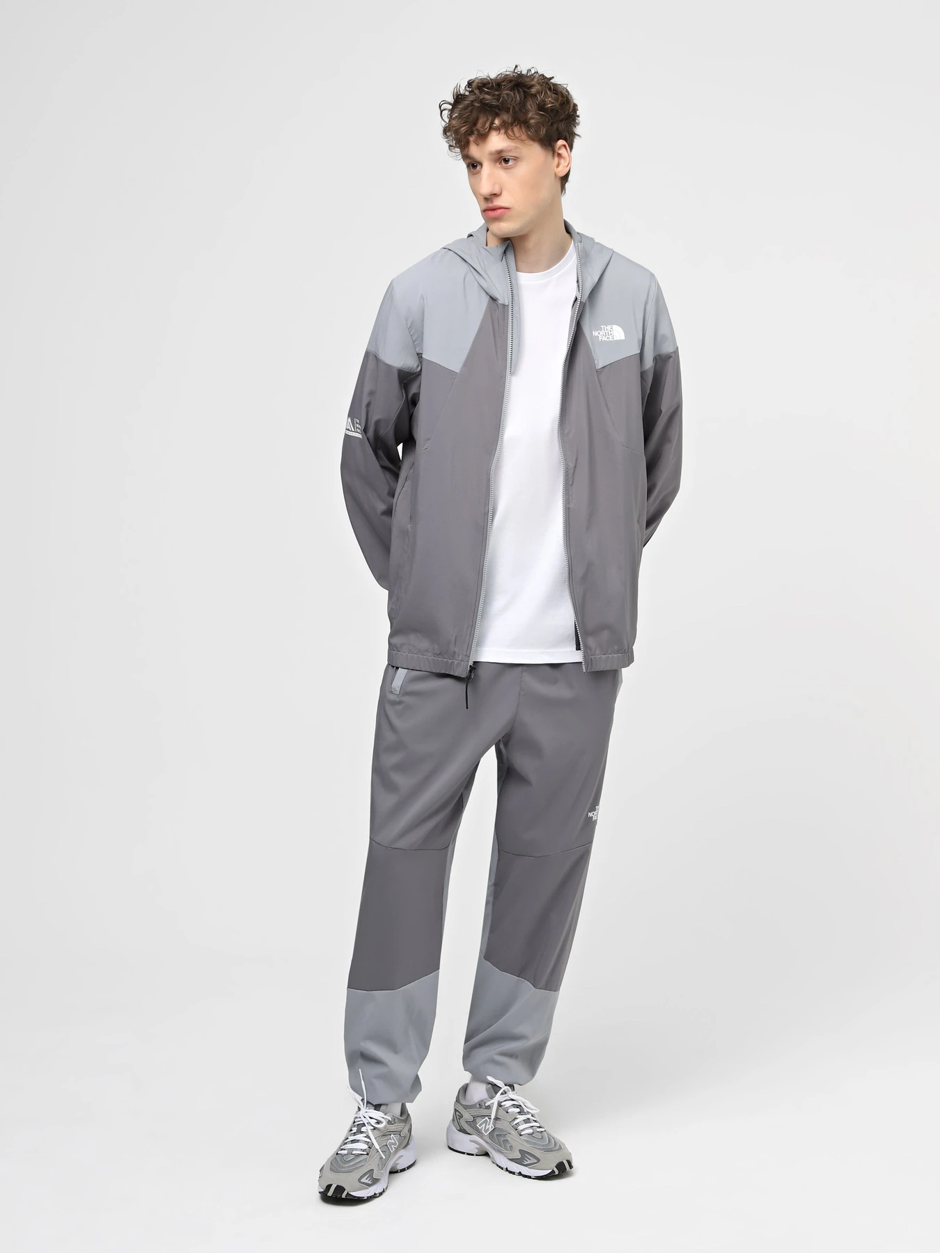 Брюки The North Face M Ma Wind Track Pant модель NF0A87J6W2O1 Брюки The North Face M Ma Wind Track Pant модель NF0A87J6W2O1 Фото