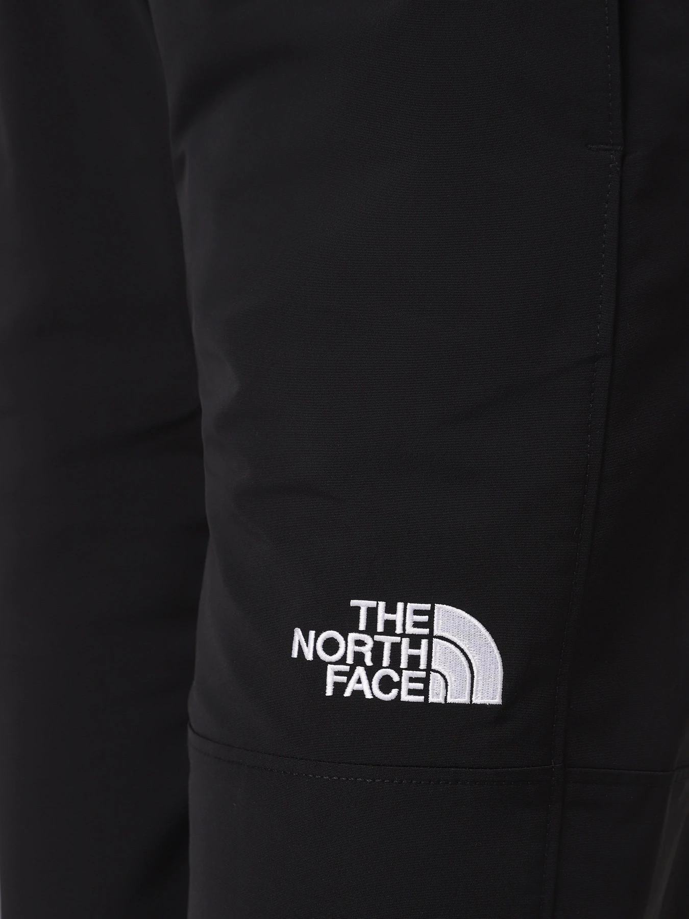 Штани The North Face Easy Wind модель NF0A8769JK31 Фото