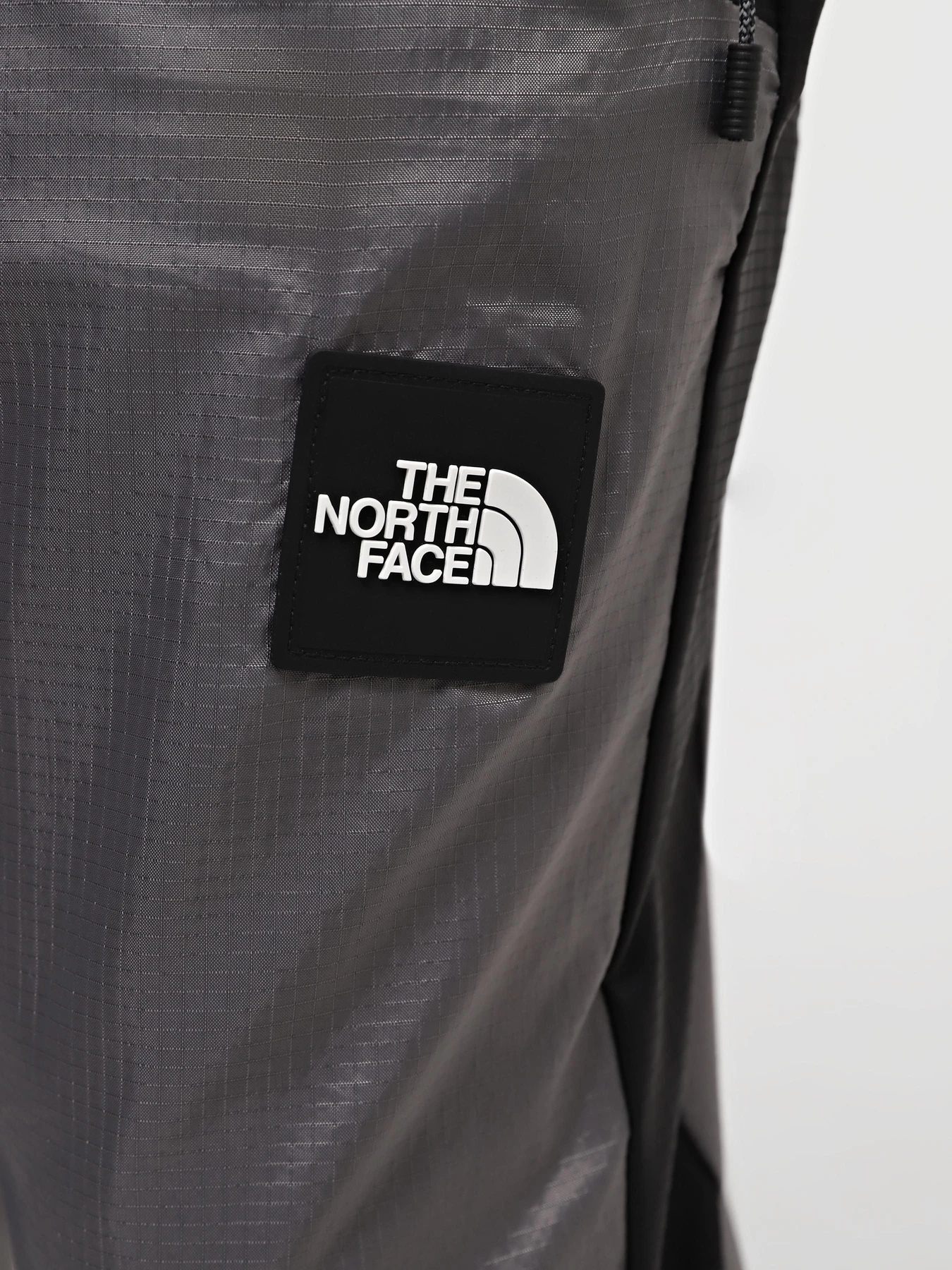Штани The North Face M Wind Shell Pant модель NF0A879QRPI1 Фото