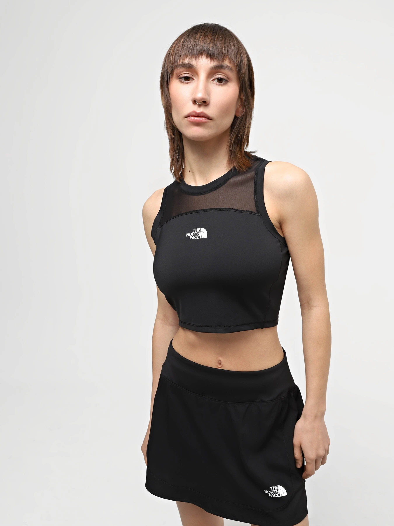 Футболки и поло The North Face W Movmynt Tiny Tank модель NF0A8815JK31 Футболки и поло The North Face W Movmynt Tiny Tank модель NF0A8815JK31 Фото