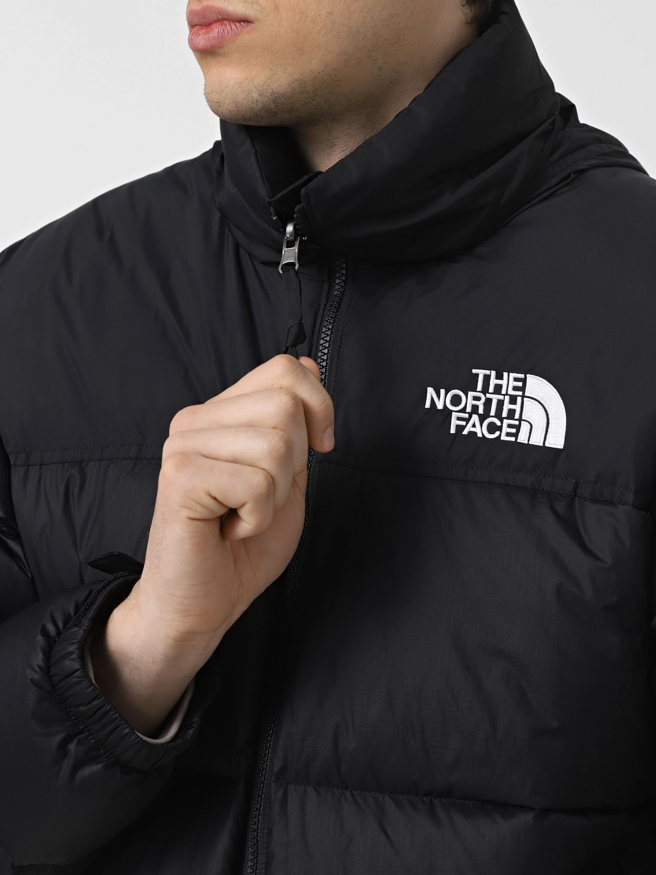 Куртки та дублянки The North Face 1996 Retro Nuptse модель NF0A3C8D4G31 Фото