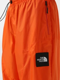 Штани The North Face x Yinka Ilori Windshell модель NF0A89GPA6M1 Фото
