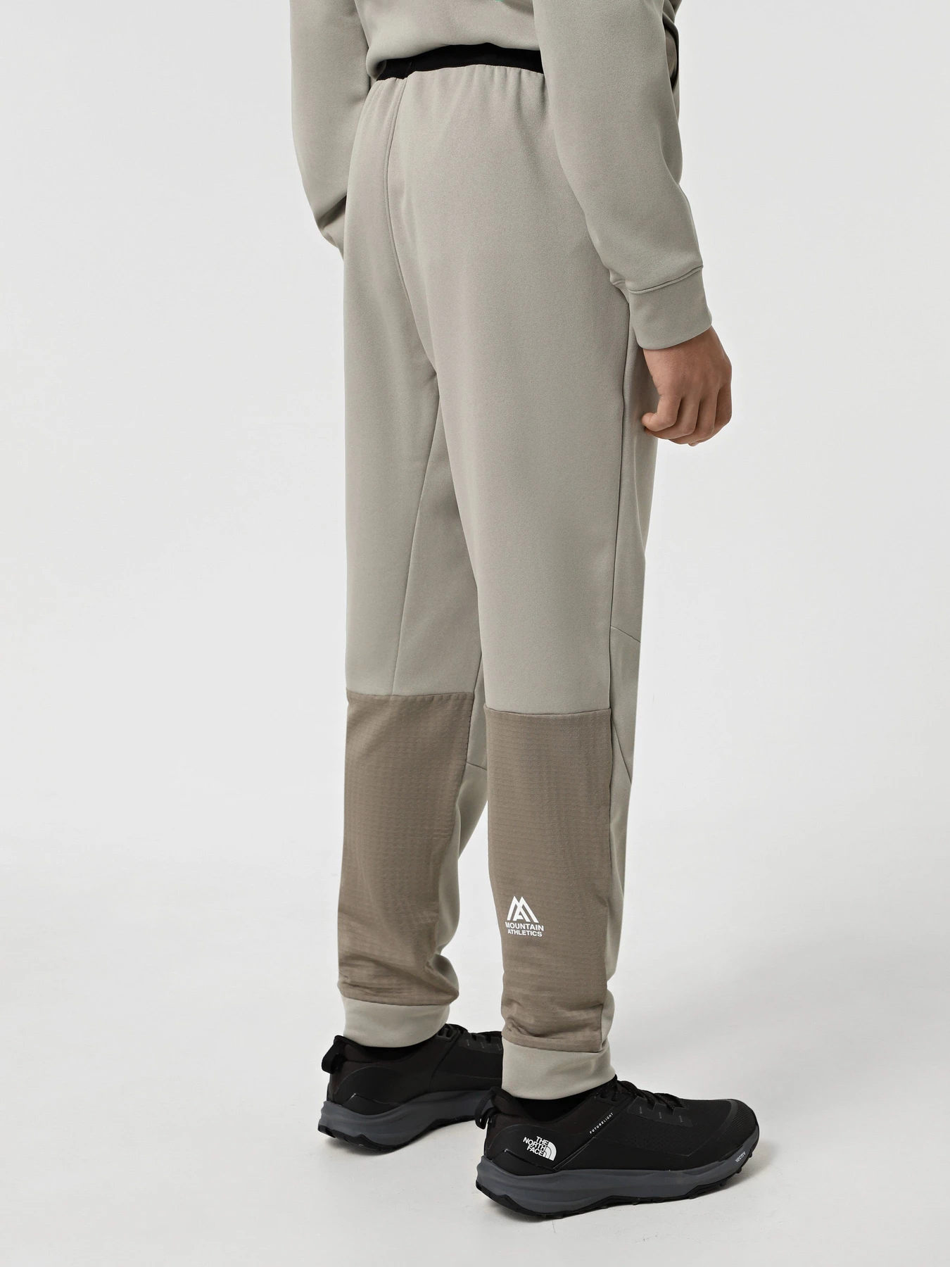 Брюки The North Face Mountain Athletics Fleece модель NF0A893S5II1 Брюки The North Face Mountain Athletics Fleece модель NF0A893S5II1 Фото