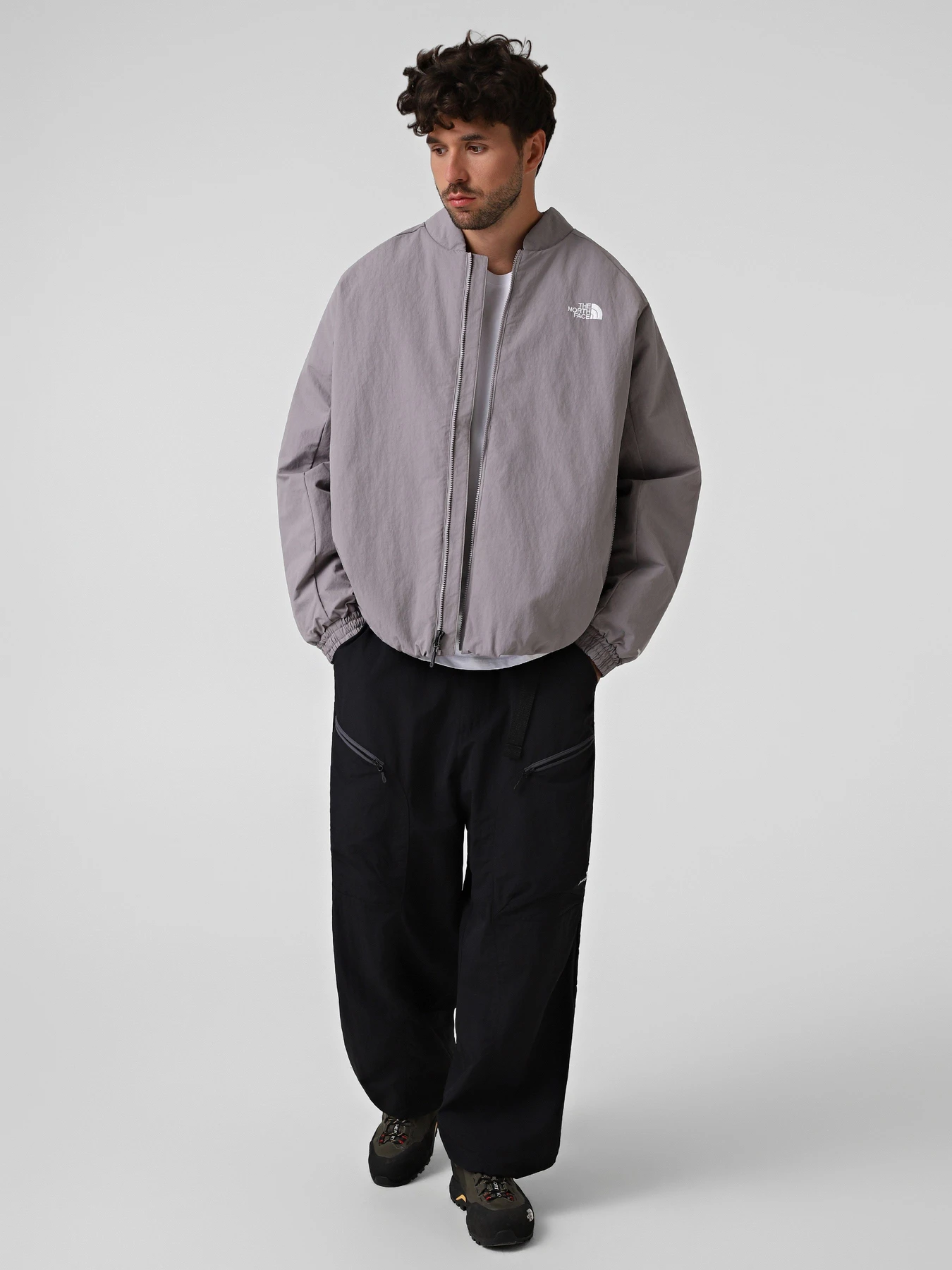 Куртки и дубленки The North Face U NSE LIGHT INSULATED BOMBER J модель NF0A8G8YG7O1 Куртки и дубленки The North Face U NSE LIGHT INSULATED BOMBER J модель NF0A8G8YG7O1 Фото