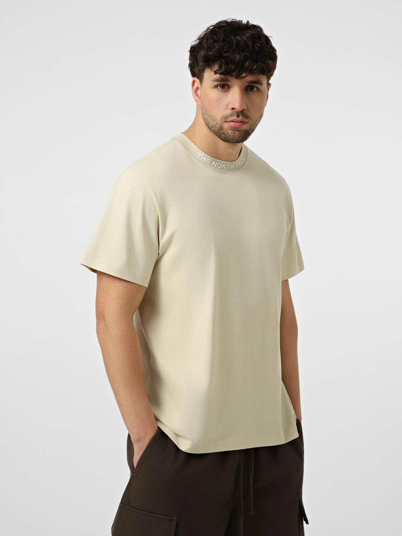 Футболки і поло The North Face M ZUMU RELAXED SHORT SLEEVE TE модель NF0A8GUYDOM1 Фото
