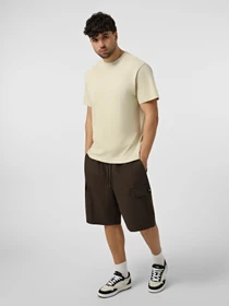 Футболки і поло The North Face M ZUMU RELAXED SHORT SLEEVE TE модель NF0A8GUYDOM1 Фото
