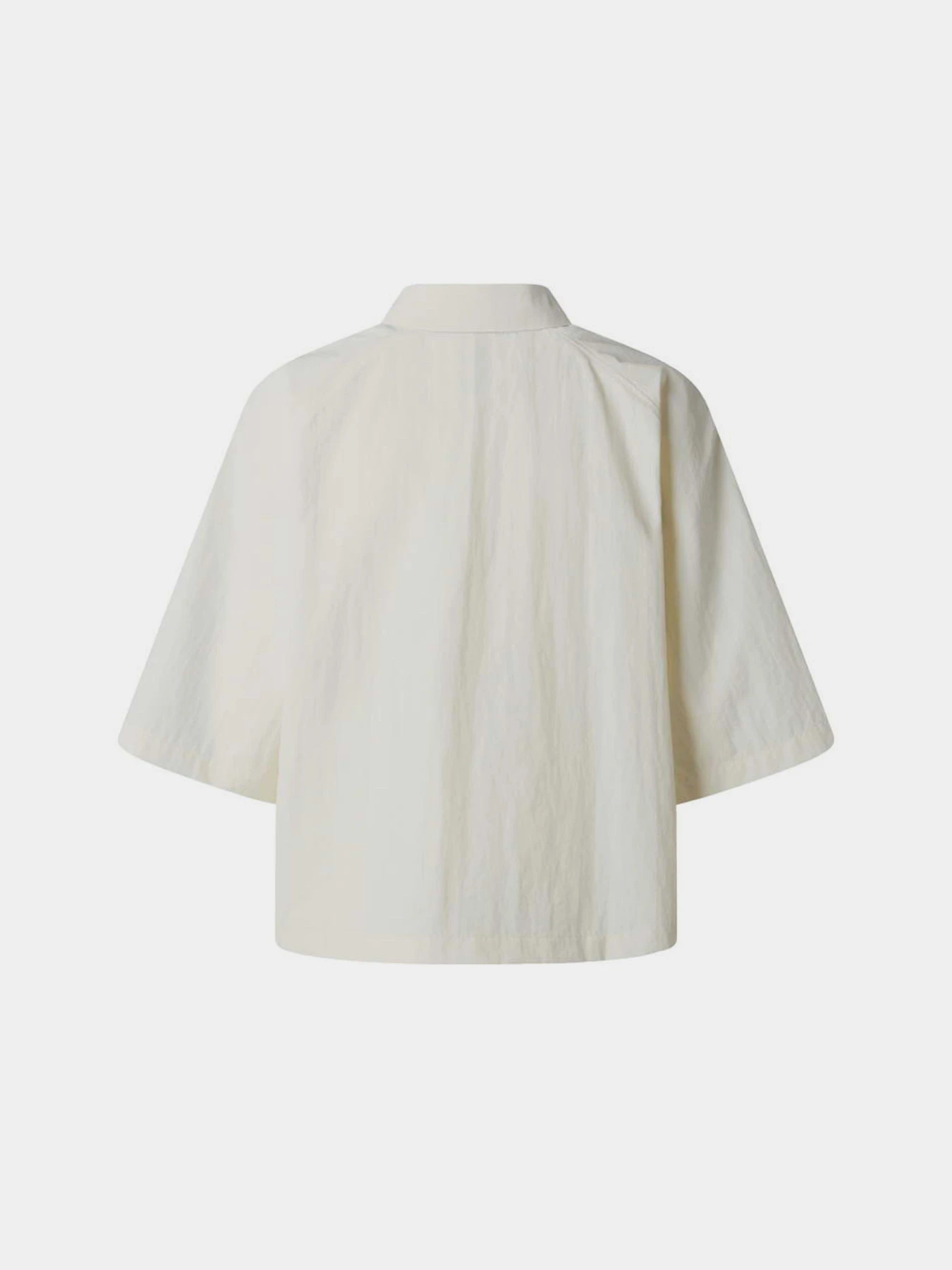 Сорочки The North Face W TNF RED BOX NYLON S/S SHIRT модель NF0A8FHBQLI1 Фото