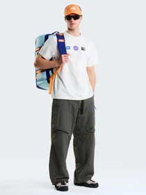 Футболки и поло The North Face U EXPLORER BADGES RELAXED SHOR модель NF0A8JA1QLI1 Фото