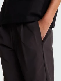 Брюки The North Face W TNF BLACK BOX TECH WOVEN PAN модель NF0A8JJ3NO11 Фото