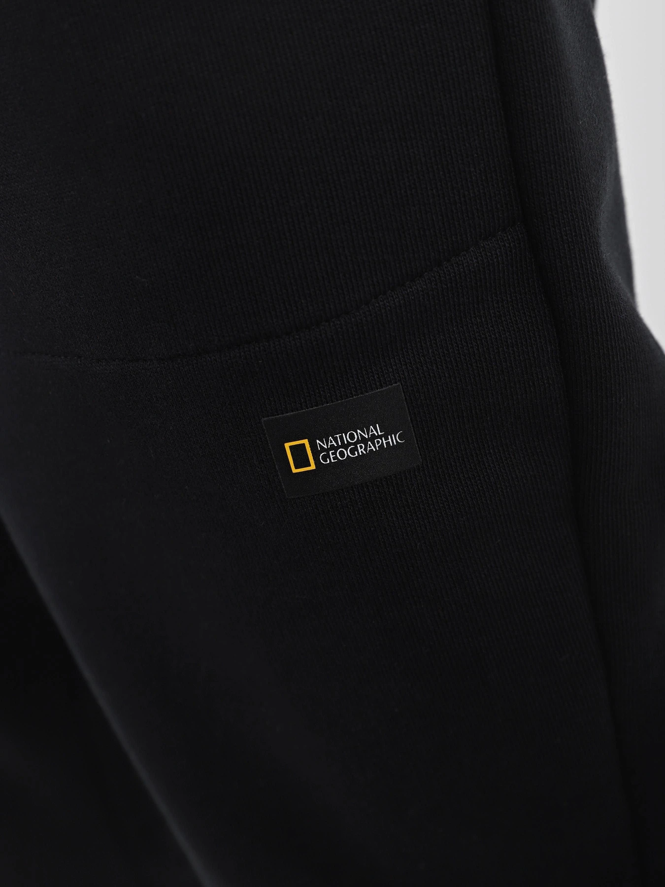 Брюки National Geographic Foundation Small Logo Jogger модель W999-05-931_чорний Брюки National Geographic Foundation Small Logo Jogger модель W999-05-931_чорний Фото