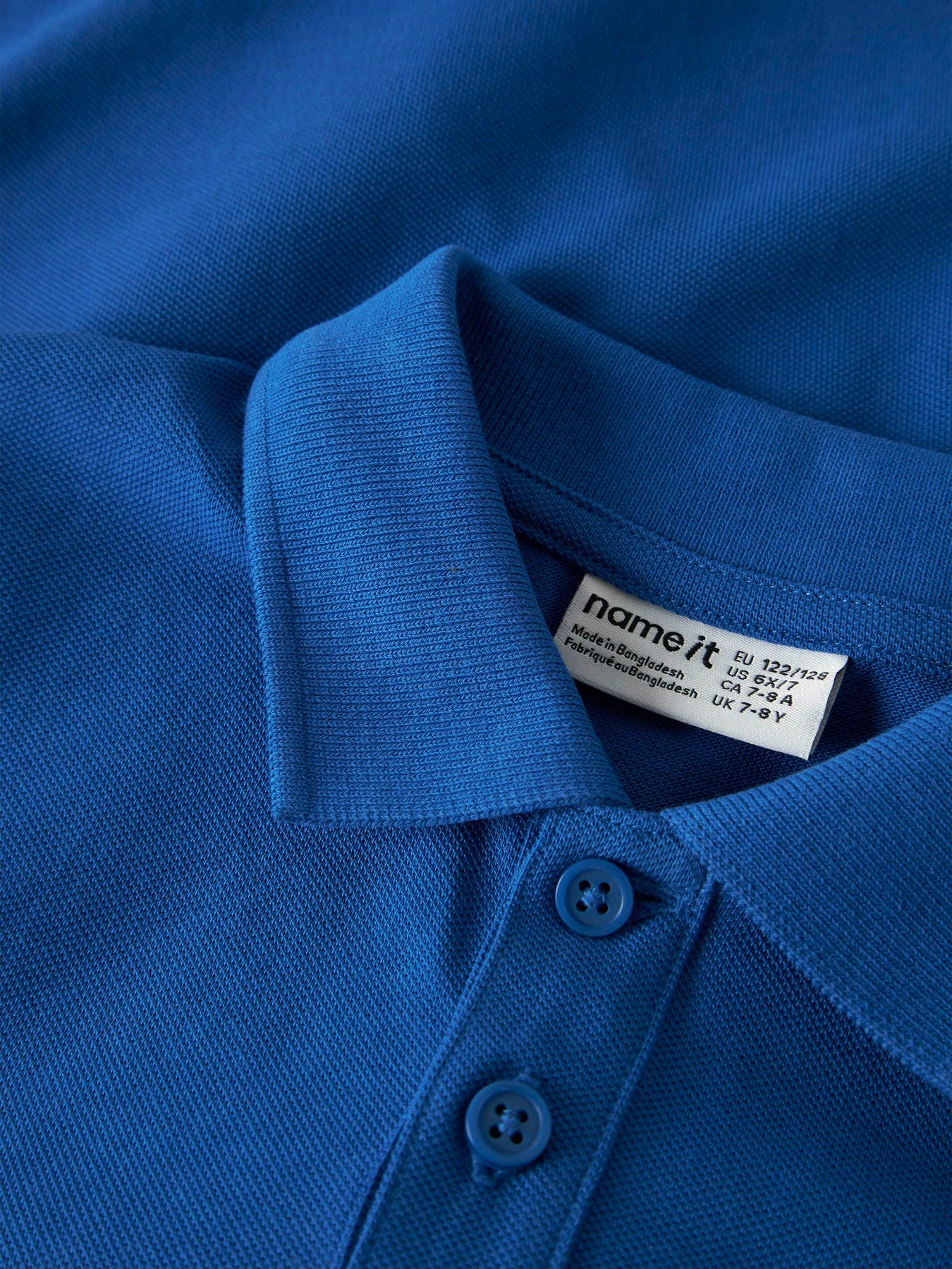 Футболки і поло Name it HANNI SS NREG POLO модель 13251000_Nautical Blue Фото