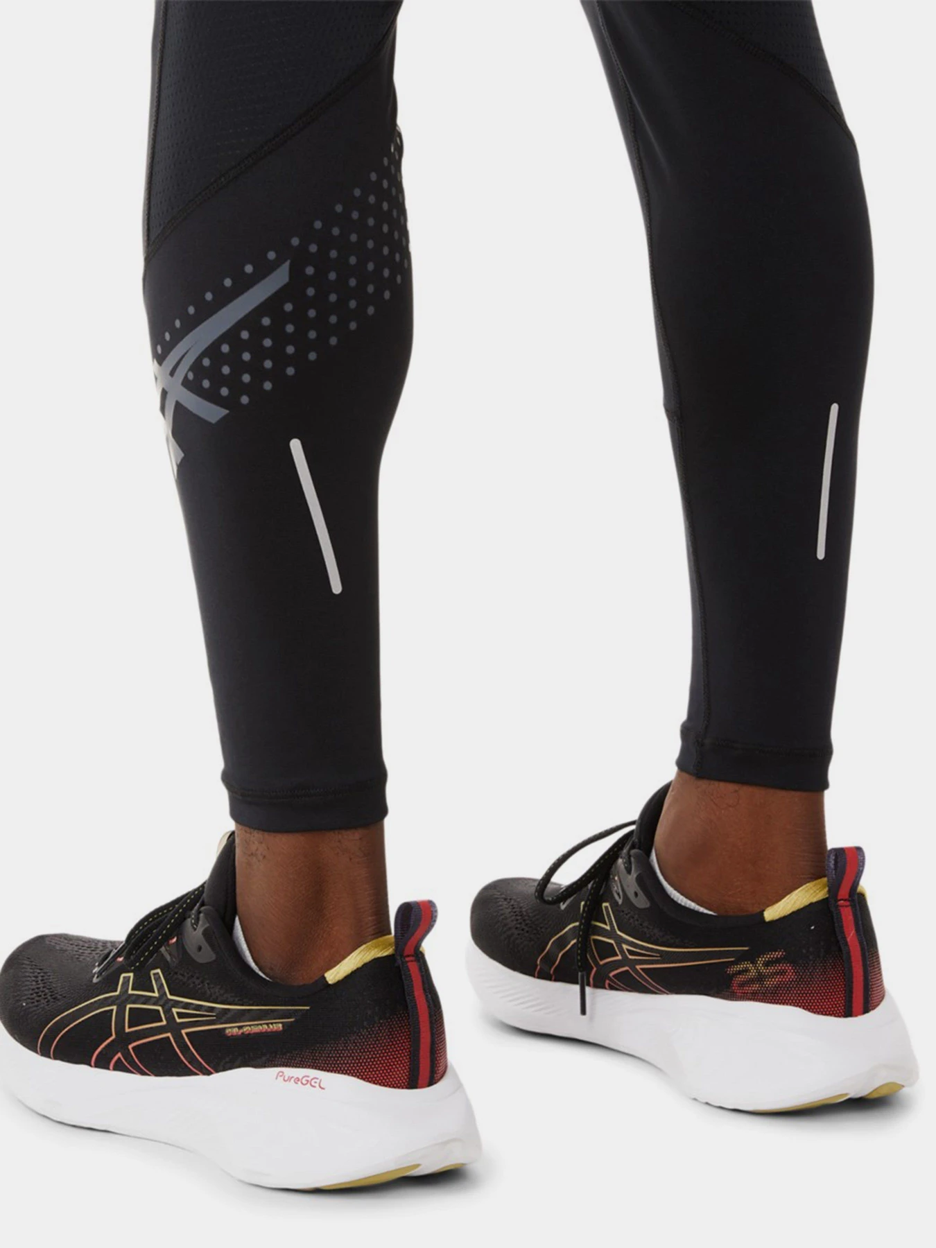 Брюки Asics Icon модель 2011C731-001 Чорний, сірий Фото