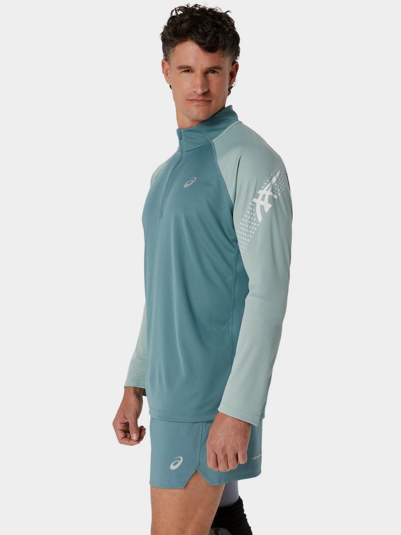 Худі та світшоти Asics Icon Ls 1/2 Zip модель 2011C732-401 Зелений Худі та світшоти Asics Icon Ls 1/2 Zip модель 2011C732-401 Зелений Фото