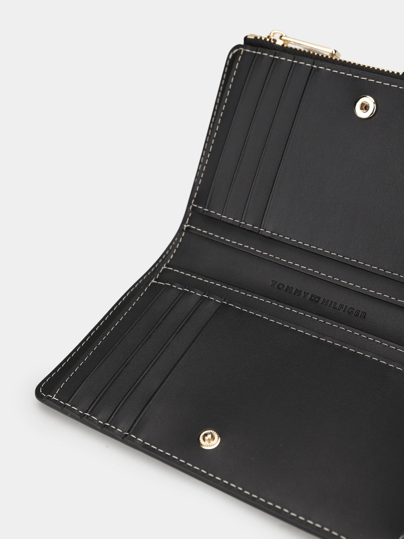 Кошельки Tommy Hilfiger TH ICON BIFOLD WALLET MONOPLAY модель AW0AW18594-0GJ Фото