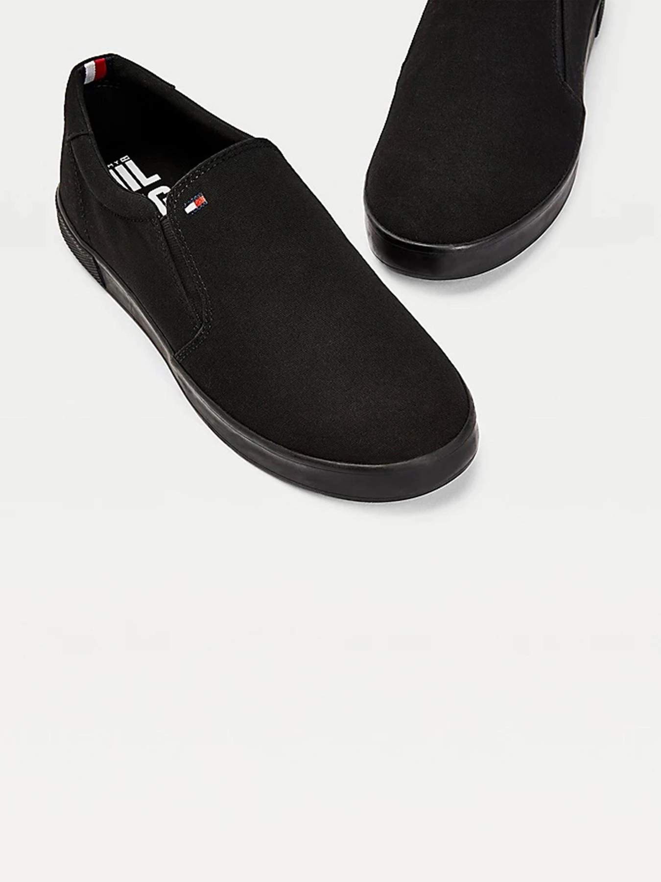 Сліпони та мокасини Tommy Hilfiger  ICONIC SLIP ON SNEAKER модель FM0FM00597-0GK Фото