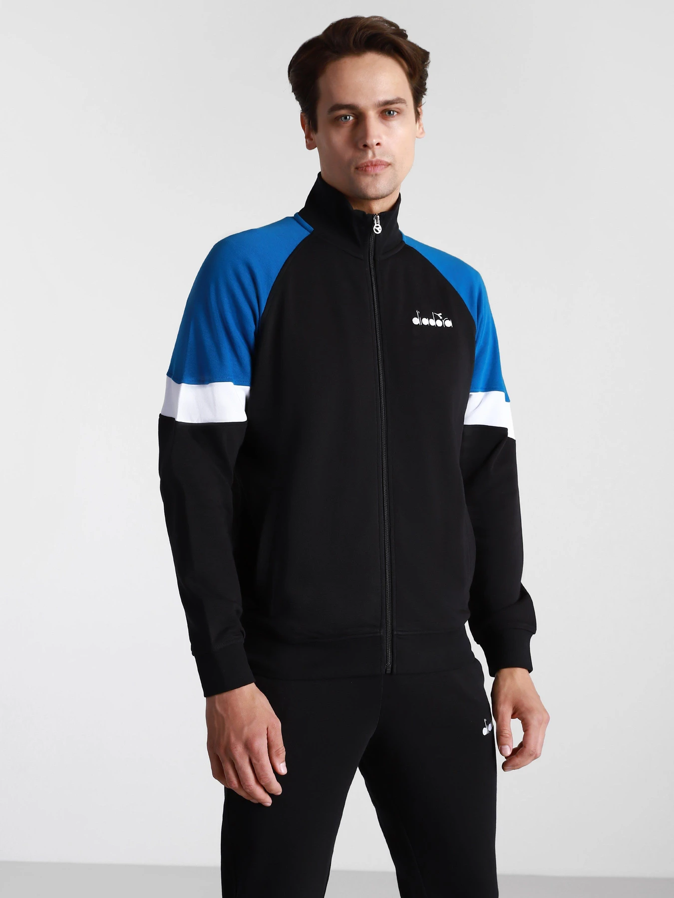 Костюмы DIADORA FZ CUFF SUIT CORE модель 102.176464.80013 Костюмы DIADORA FZ CUFF SUIT CORE модель 102.176464.80013 Фото