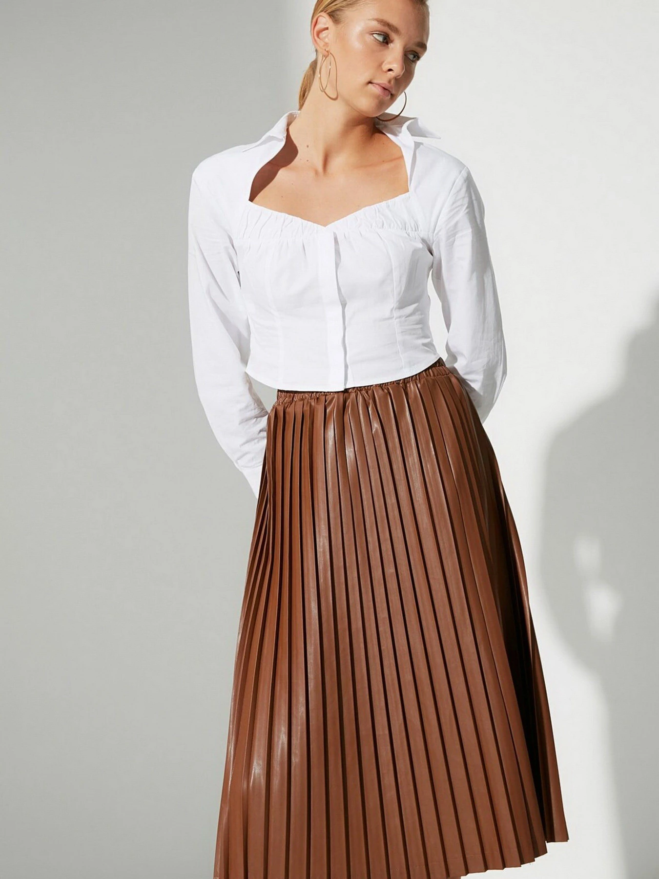 Юбки Trendyol модель TWOAW22ET0075/Kahverengi Юбки Trendyol модель TWOAW22ET0075/Kahverengi Фото