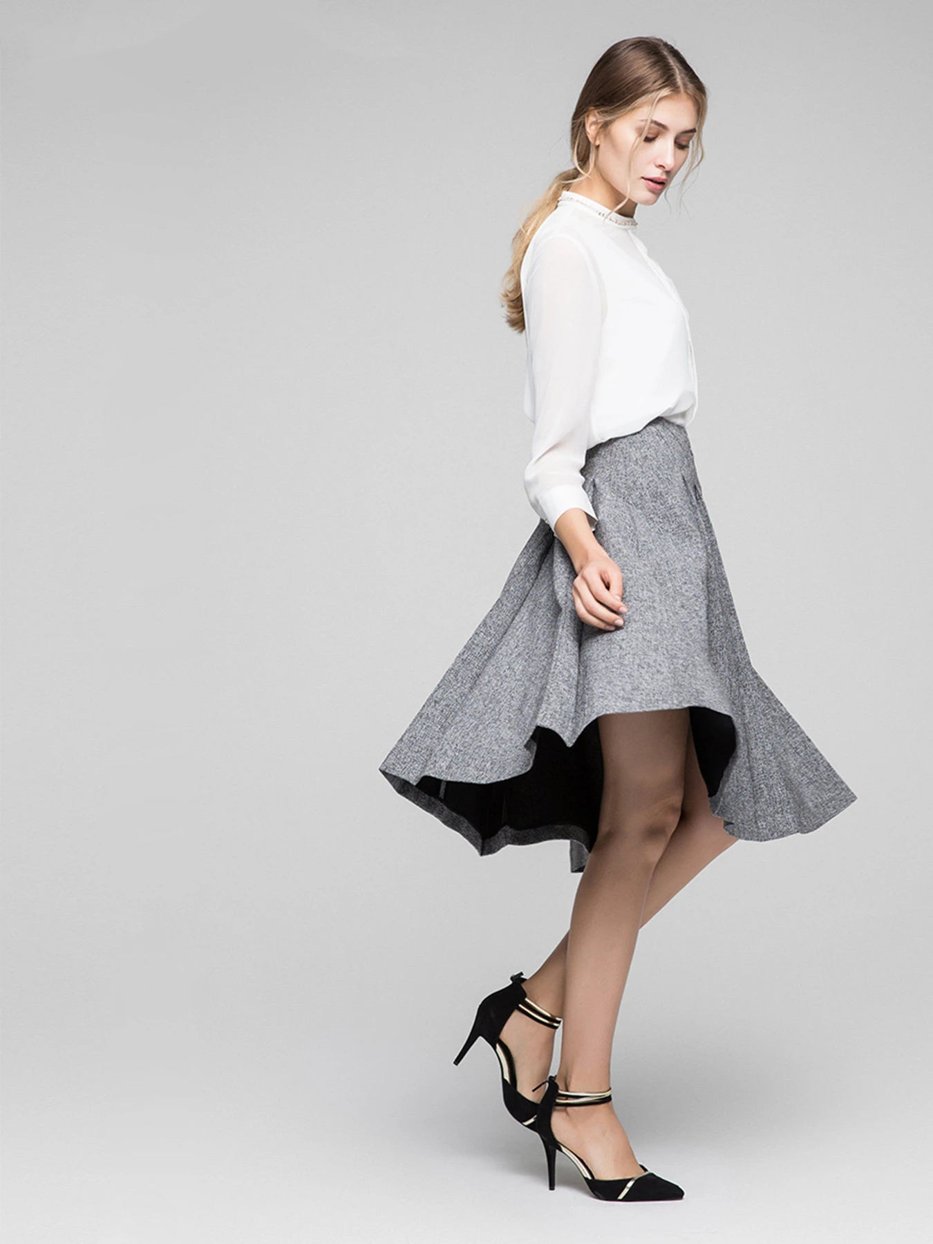 Спідниці Vero Moda модель 317116519E90_сірий комб. Фото