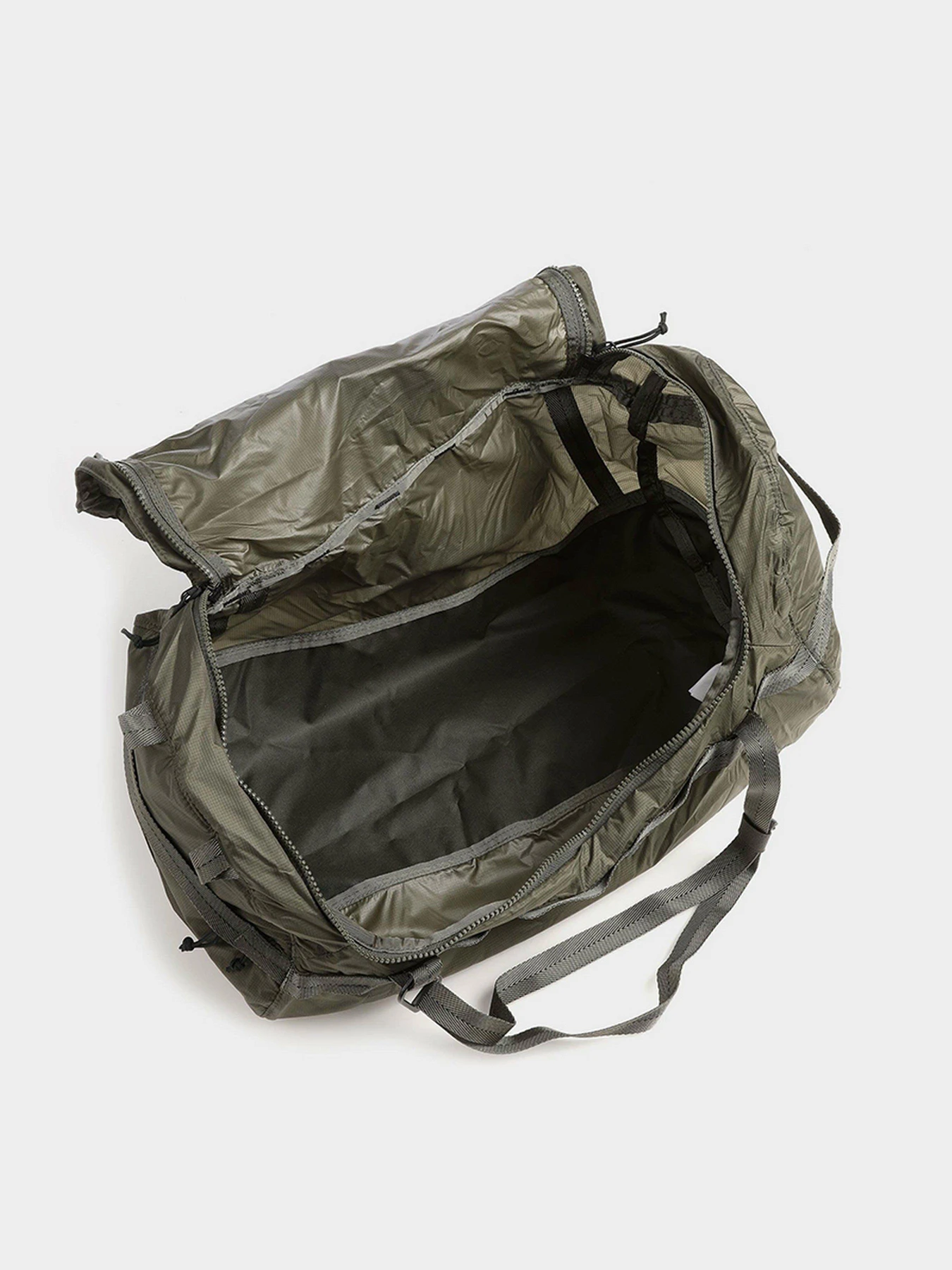 Дорожные сумки и чемоданы The North Face Flyweight Duffel модель NF0A52TL21L1 Дорожные сумки и чемоданы The North Face Flyweight Duffel модель NF0A52TL21L1 Фото